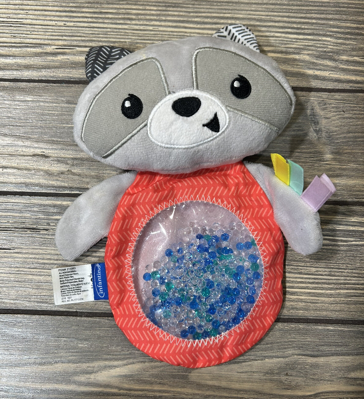 Infantino Seek and Squish and Beige Gel Pouch Baby Toy
