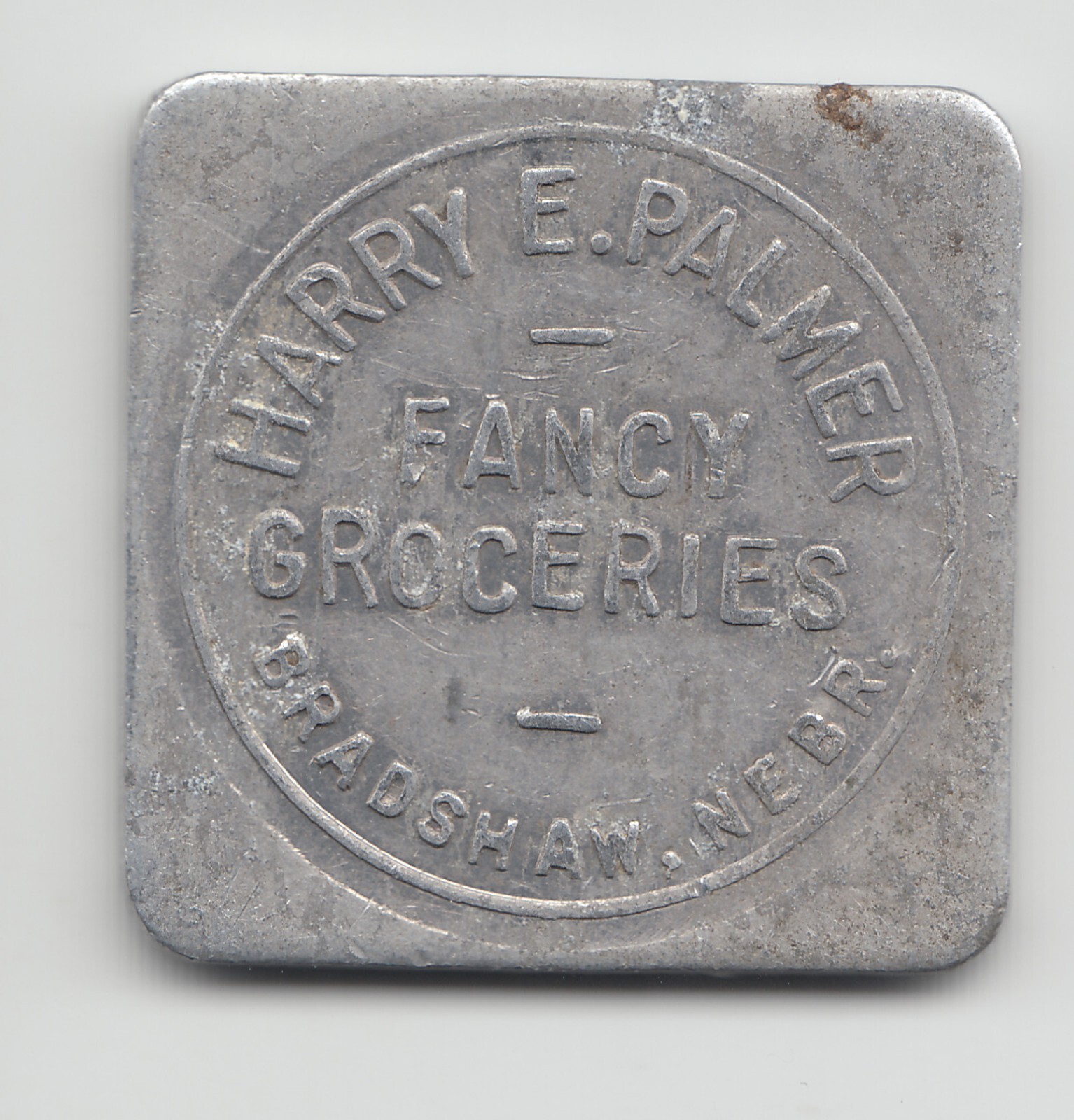 Harry E. Palmer Good For 50 cents in trade merchant token - Bradshaw NE 474