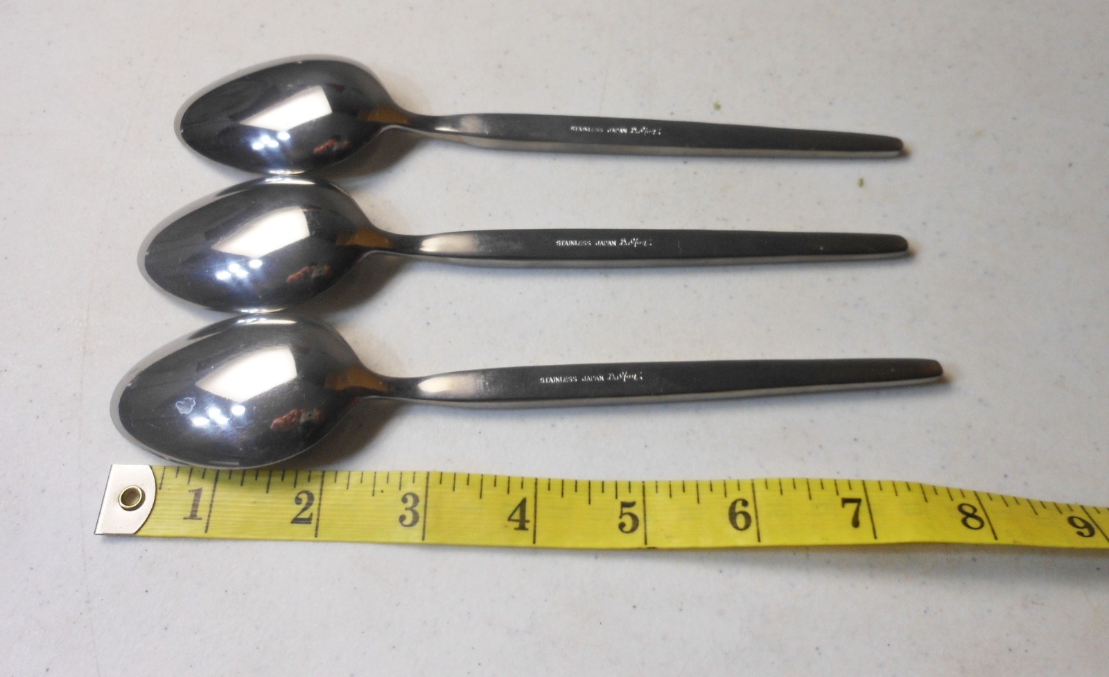 Three Oneida Dalton Stainless Spoons 8"