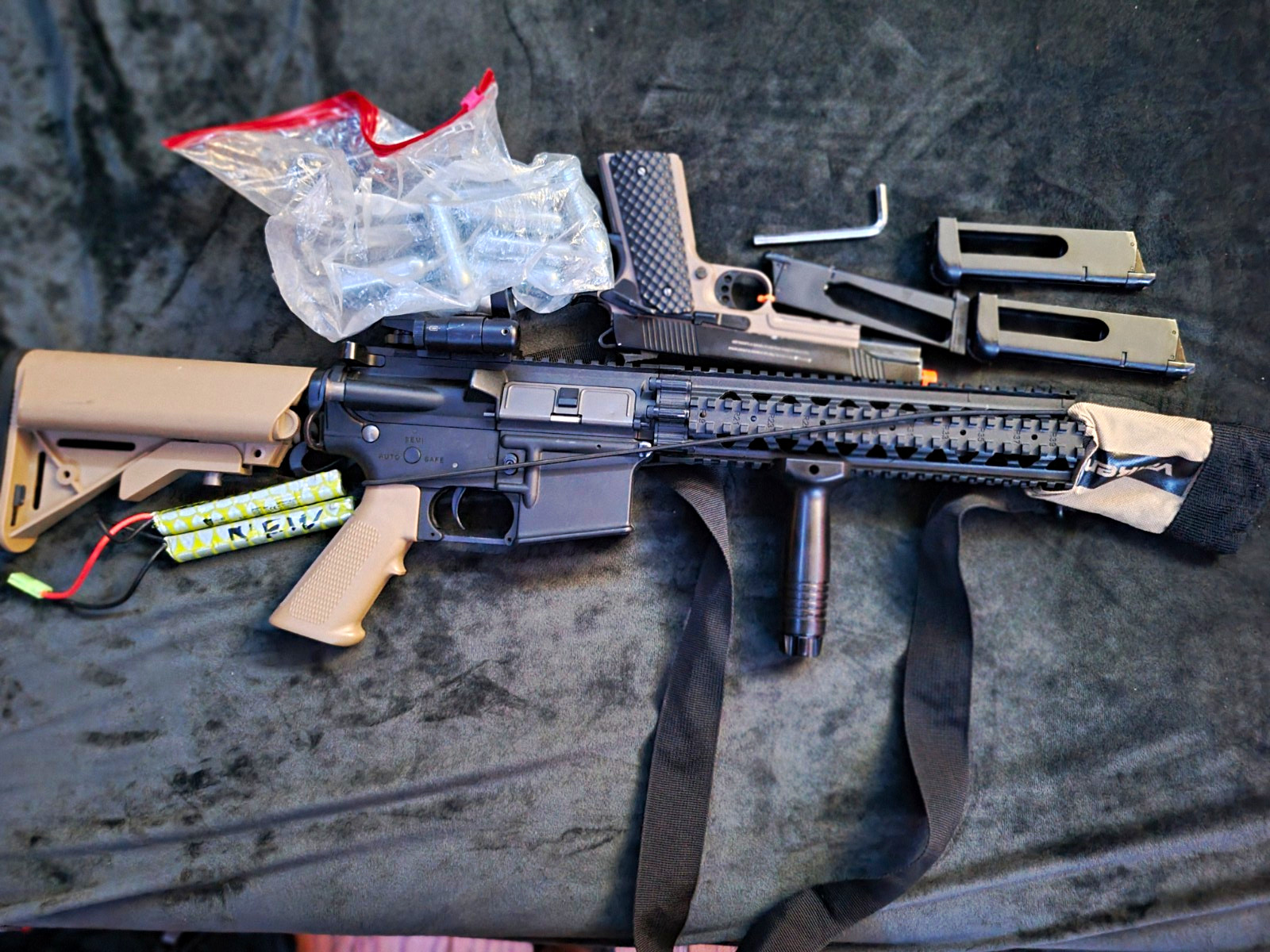 TX Armory 1911 pistol, AEG Electric rifle.