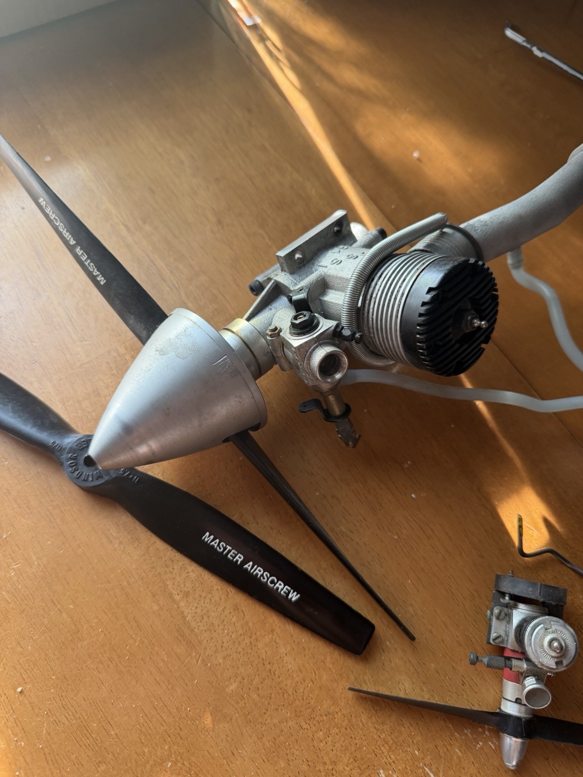 Rossi 61 Engine With Tuned Exhaust Pipe With Front Wheel And Extra Small Engine