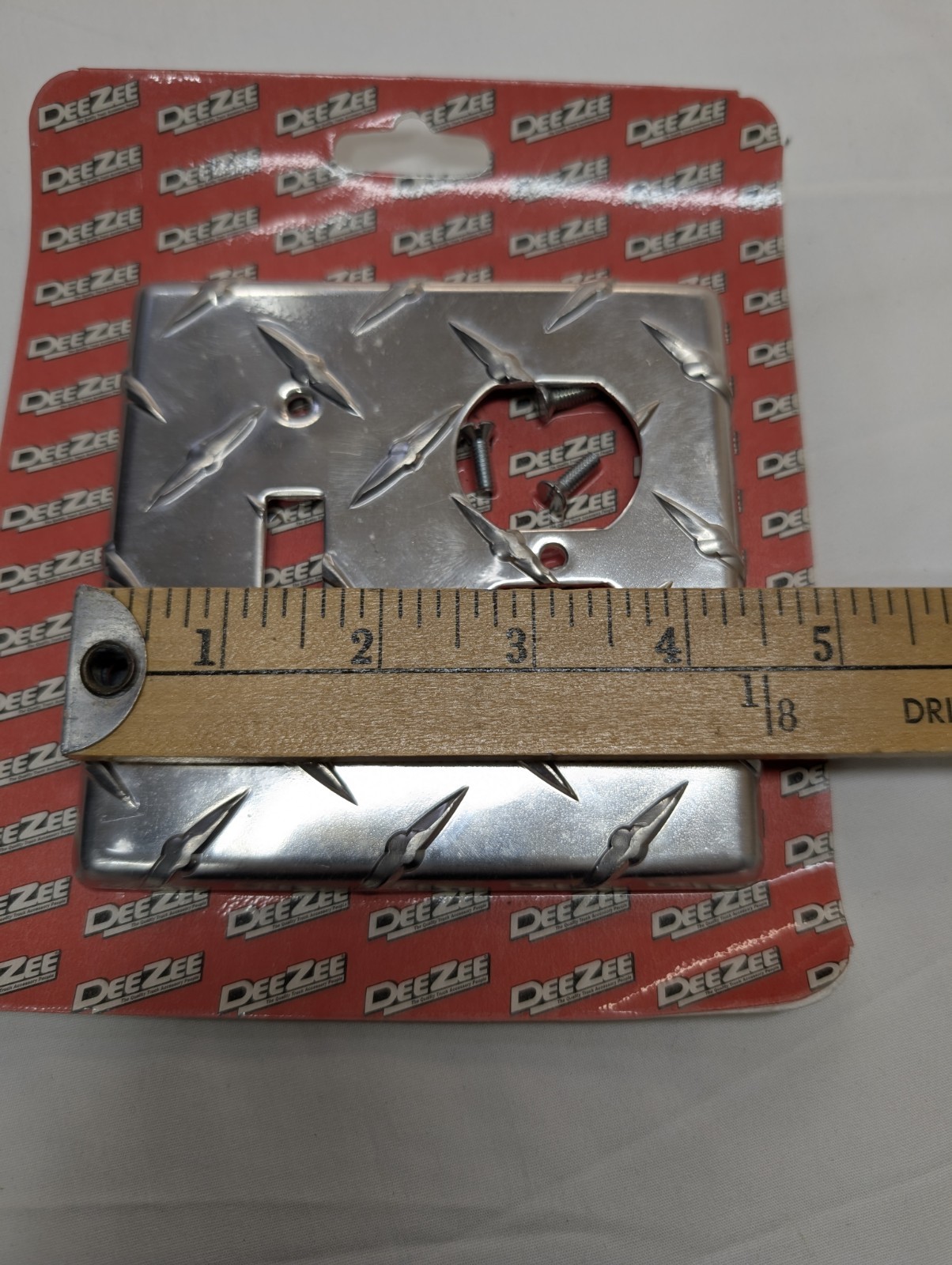 2 PCs DeeZee Brite Tread Outlet Cover. New Unopened Damaged Package