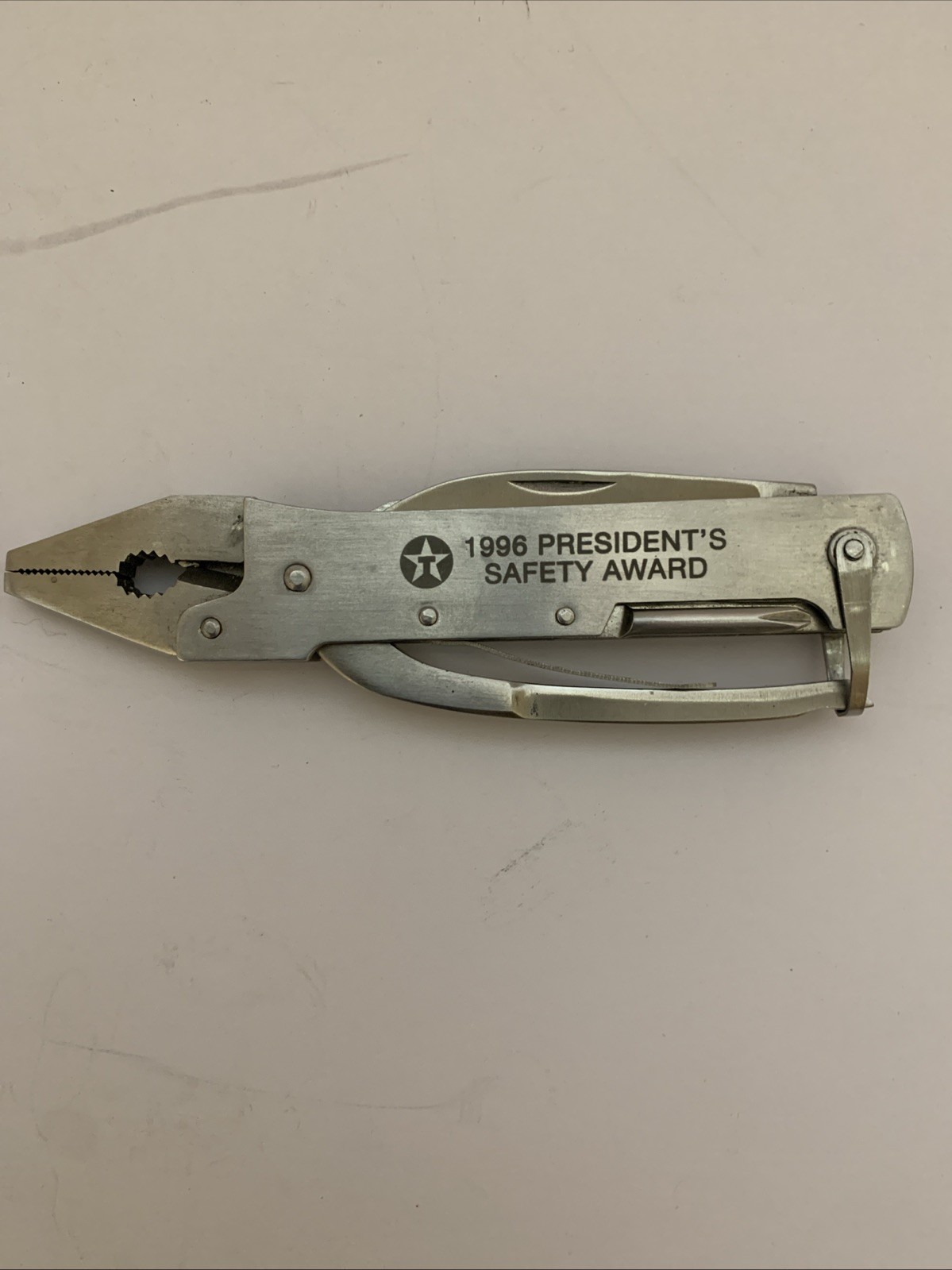 Texaco Multi-tool Pliers Plus 8 Tools. Folded 5.25” (file, Screw Driver,awl,etc)