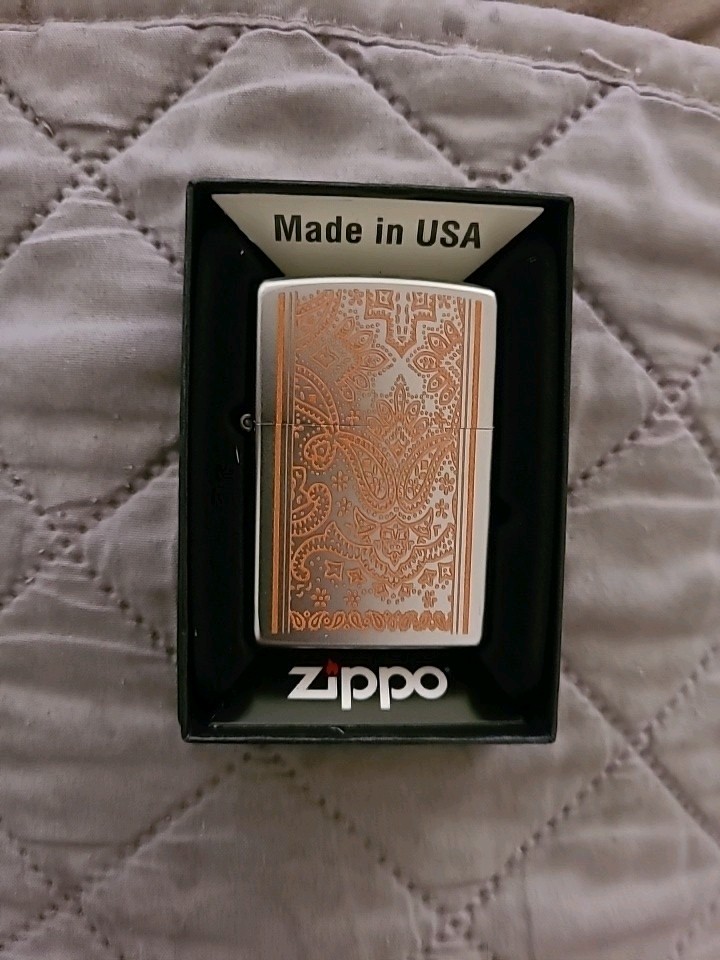 Nice Zippo 205 Orange Paisley in original box and unstruck