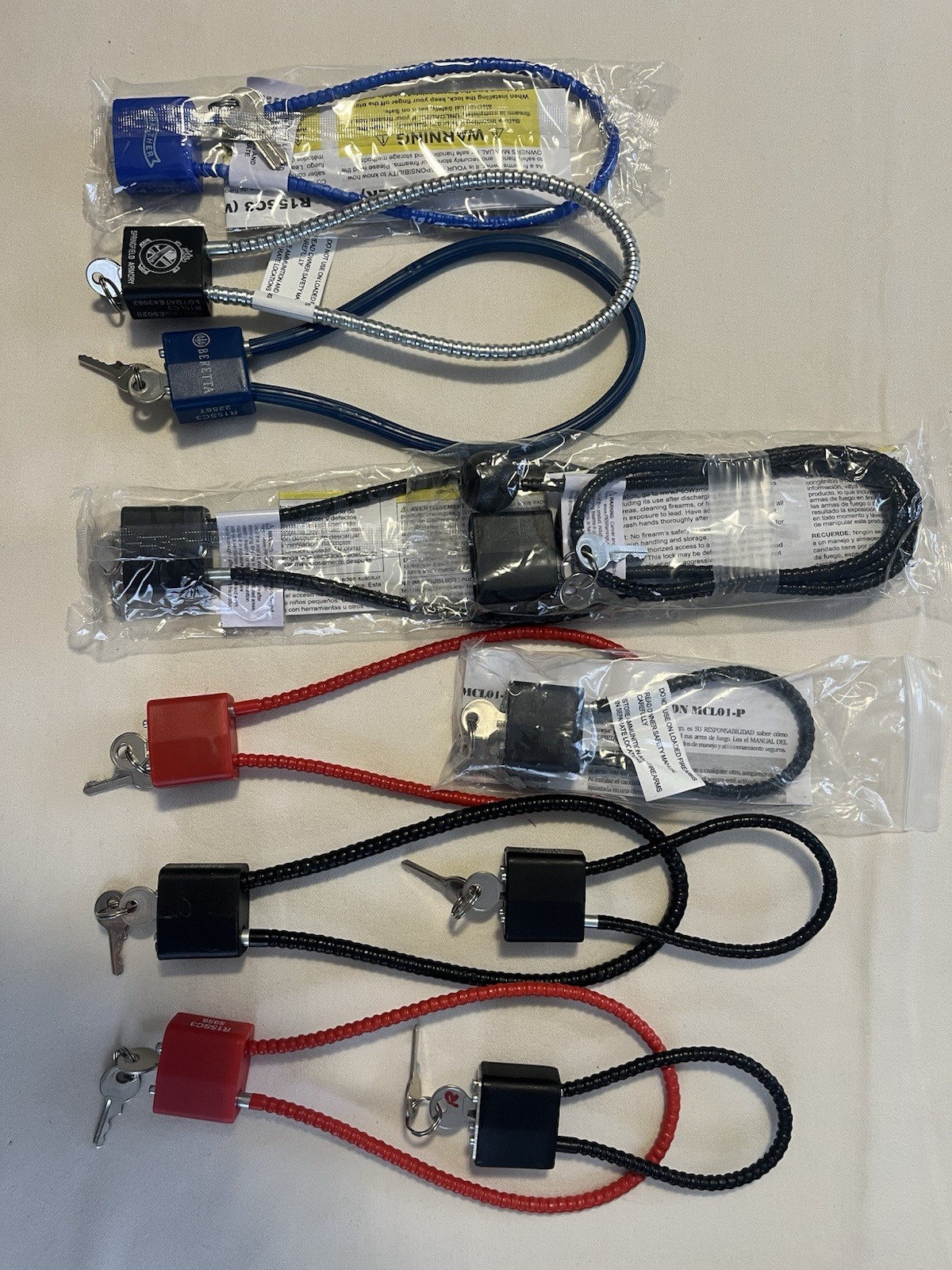 A LOT Of Cable Locks. A lot Of Locks For Use In A Variety Of Uses. Some Branded!
