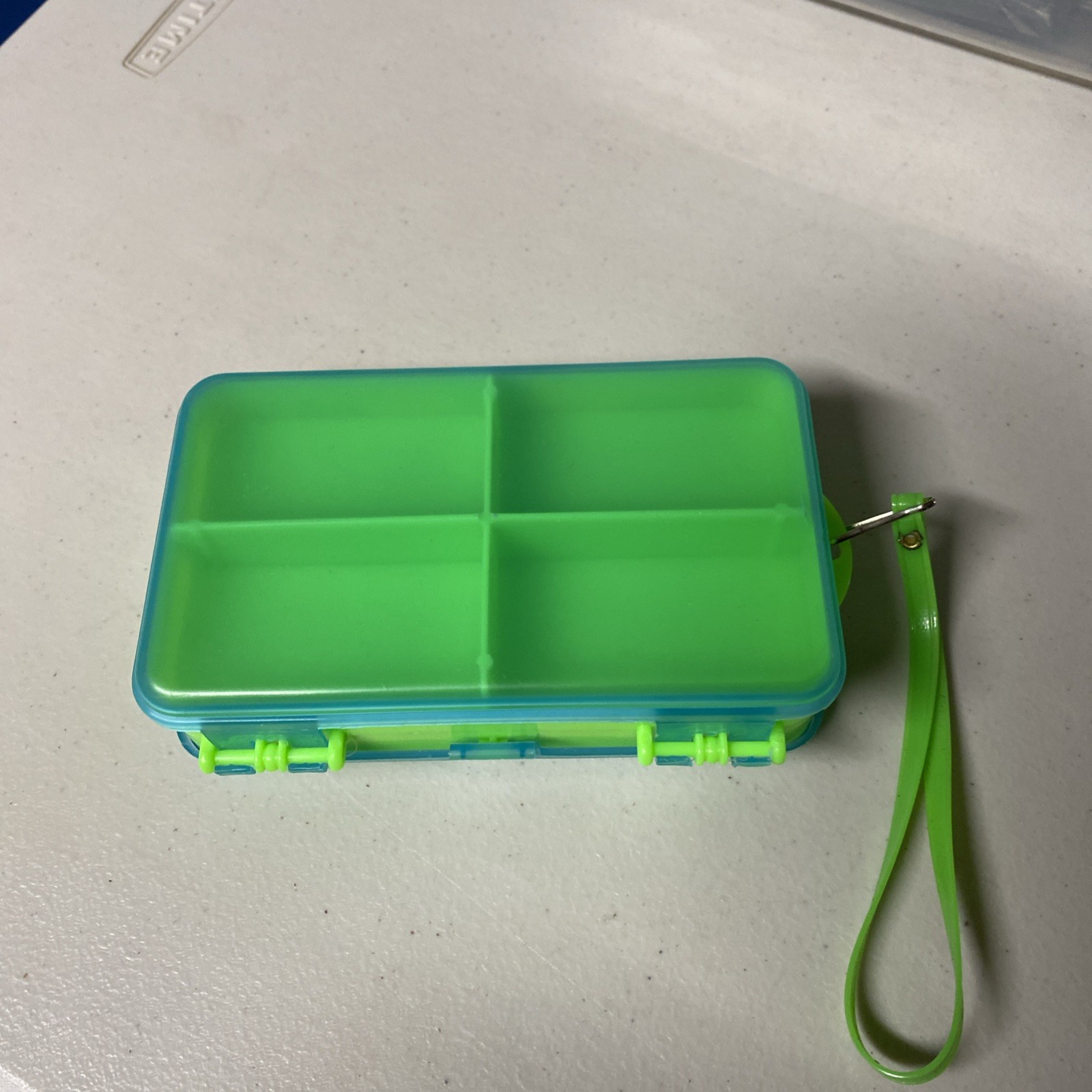 8 tray plastic green travel container with wrist strap - many possible uses