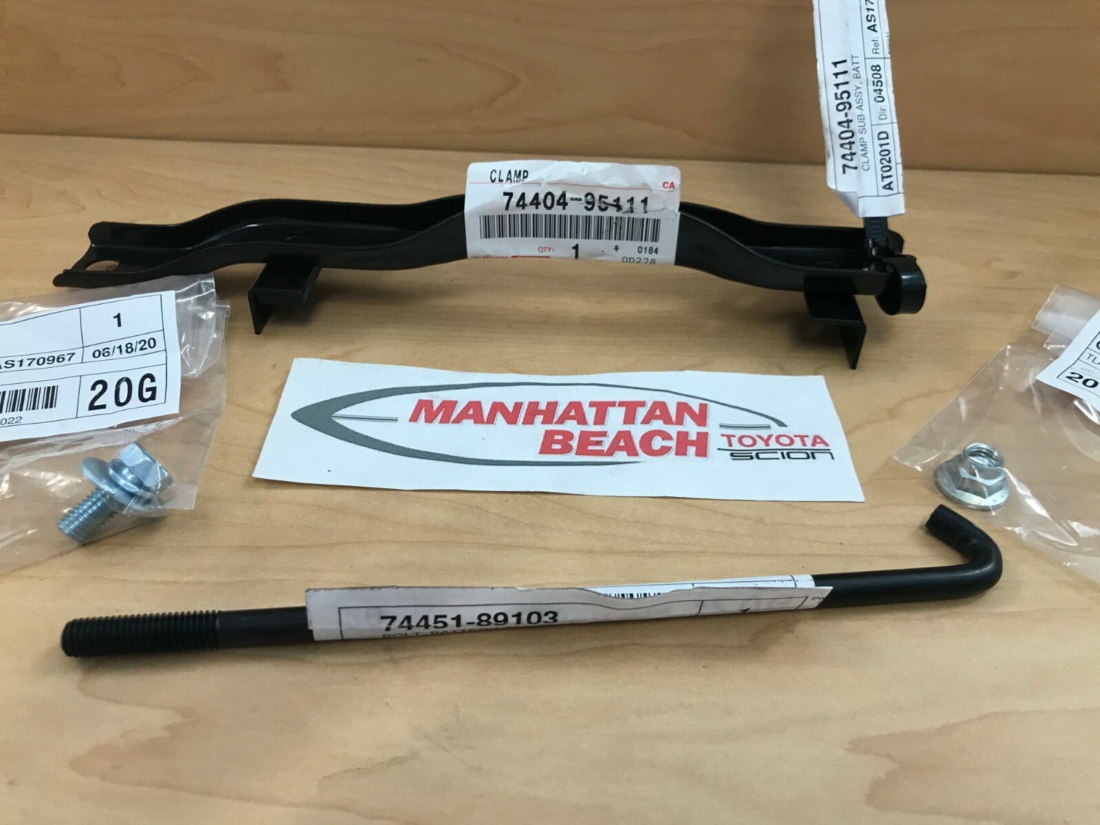 79-83 TOYOTA PICKUP TRUCK BATTERY HOLD DOWN CLAMP BRACKET WITH HARDWARE OEM