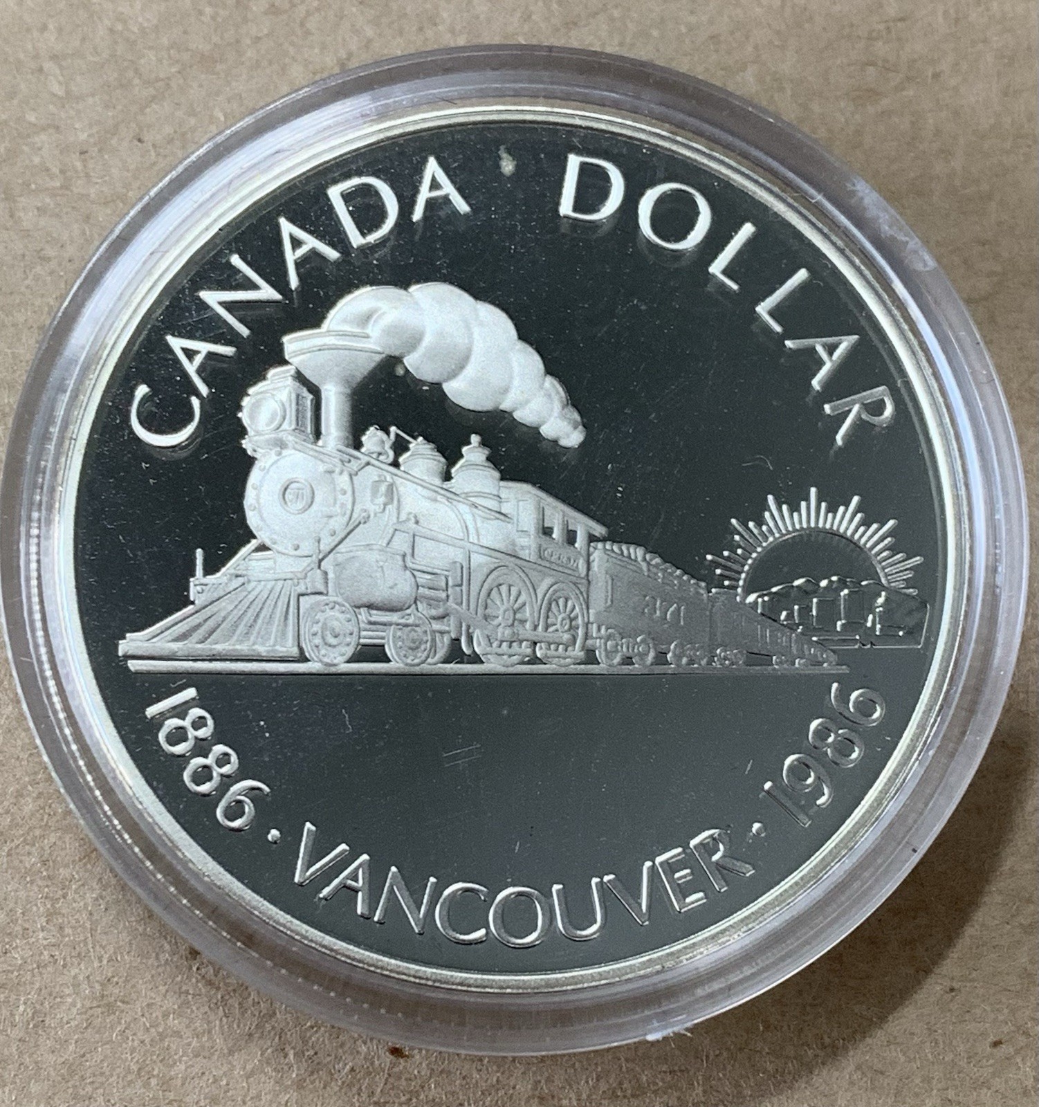 1986 Canada Silver Dollar “Vancouver”, DCAM Proof, PF++++