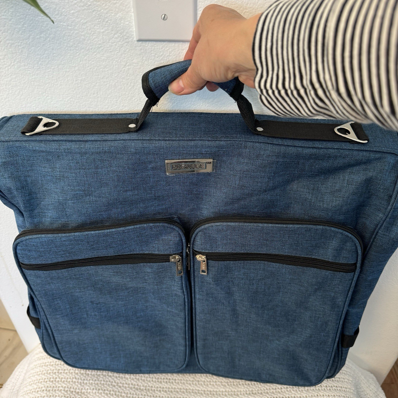 Prestige Foldable Garment Blue Bag with Multiple Zipper Pockets.
