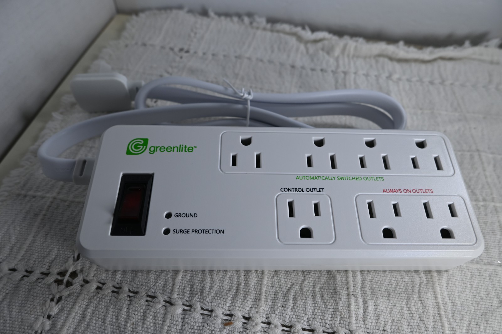 Greenlite Tier 1 advanced power strip 7 outlets sealed with instructions