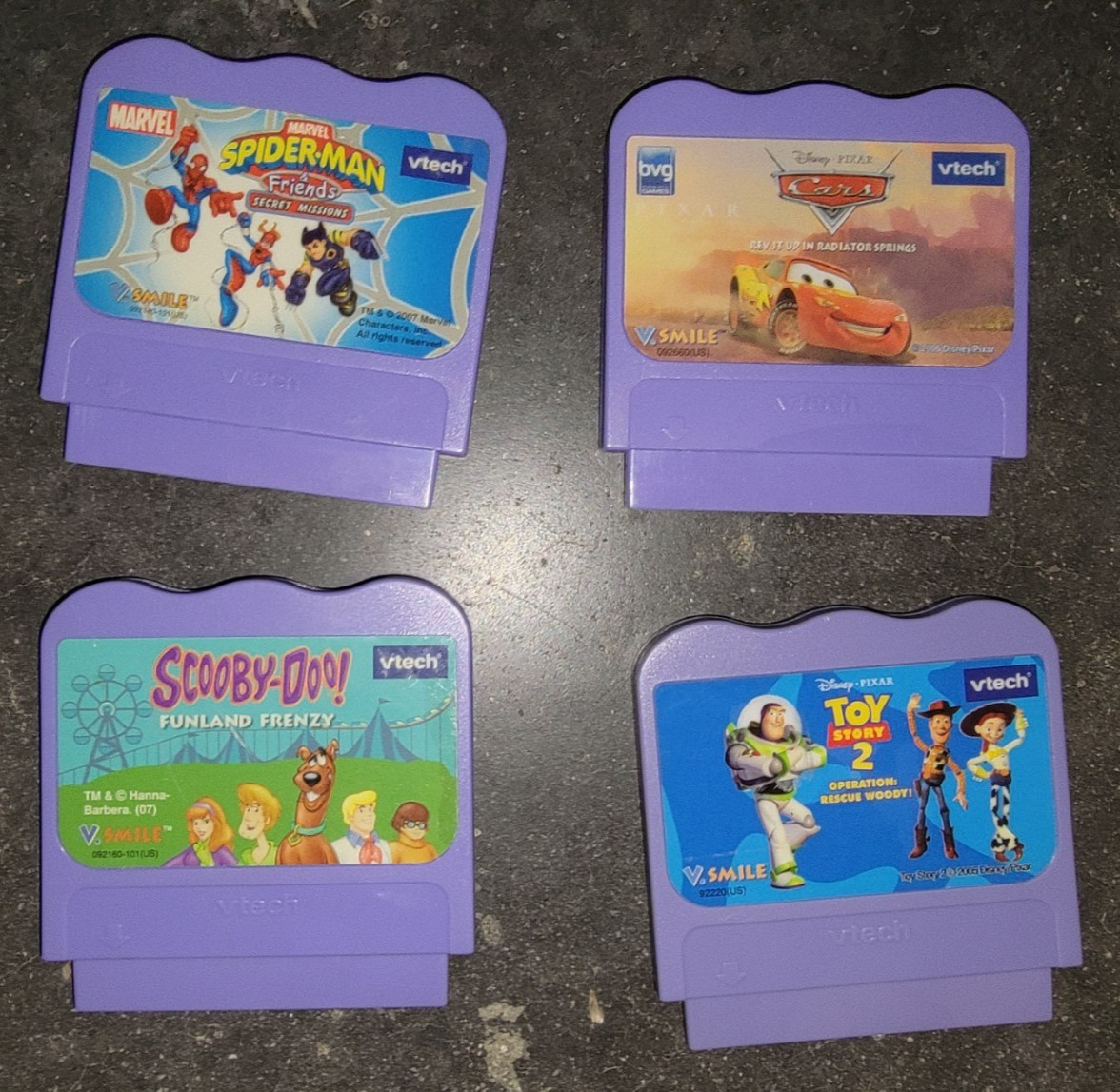 4 VTech V.Smile Game Cartridge Lot ~ Scooby Doo, Cars, Spiderman, Toy Story 2
