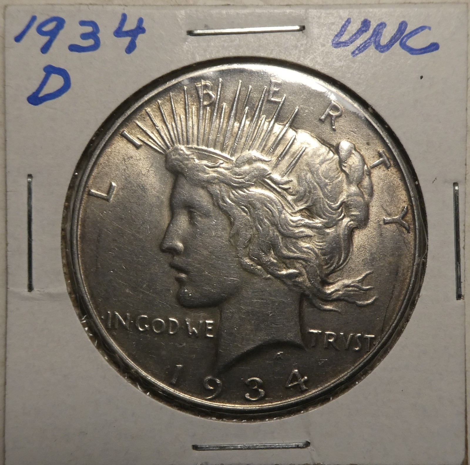 1934 D Peace Dollar /  About Uncirculated