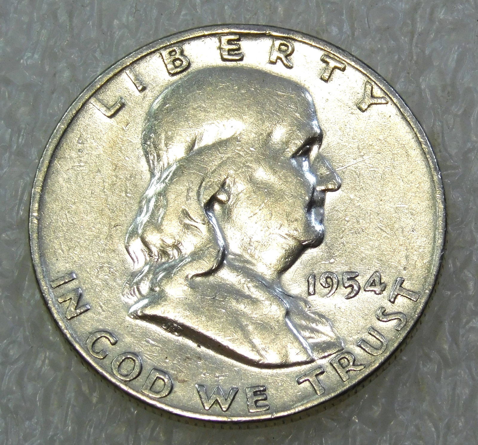 1954 D Franklin Half Dollar Frosty Bright Luster in saflip #E350