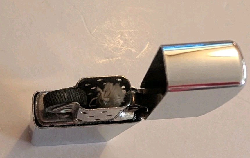 SPERRY I984 ZIPPO SLIM LIGHTER