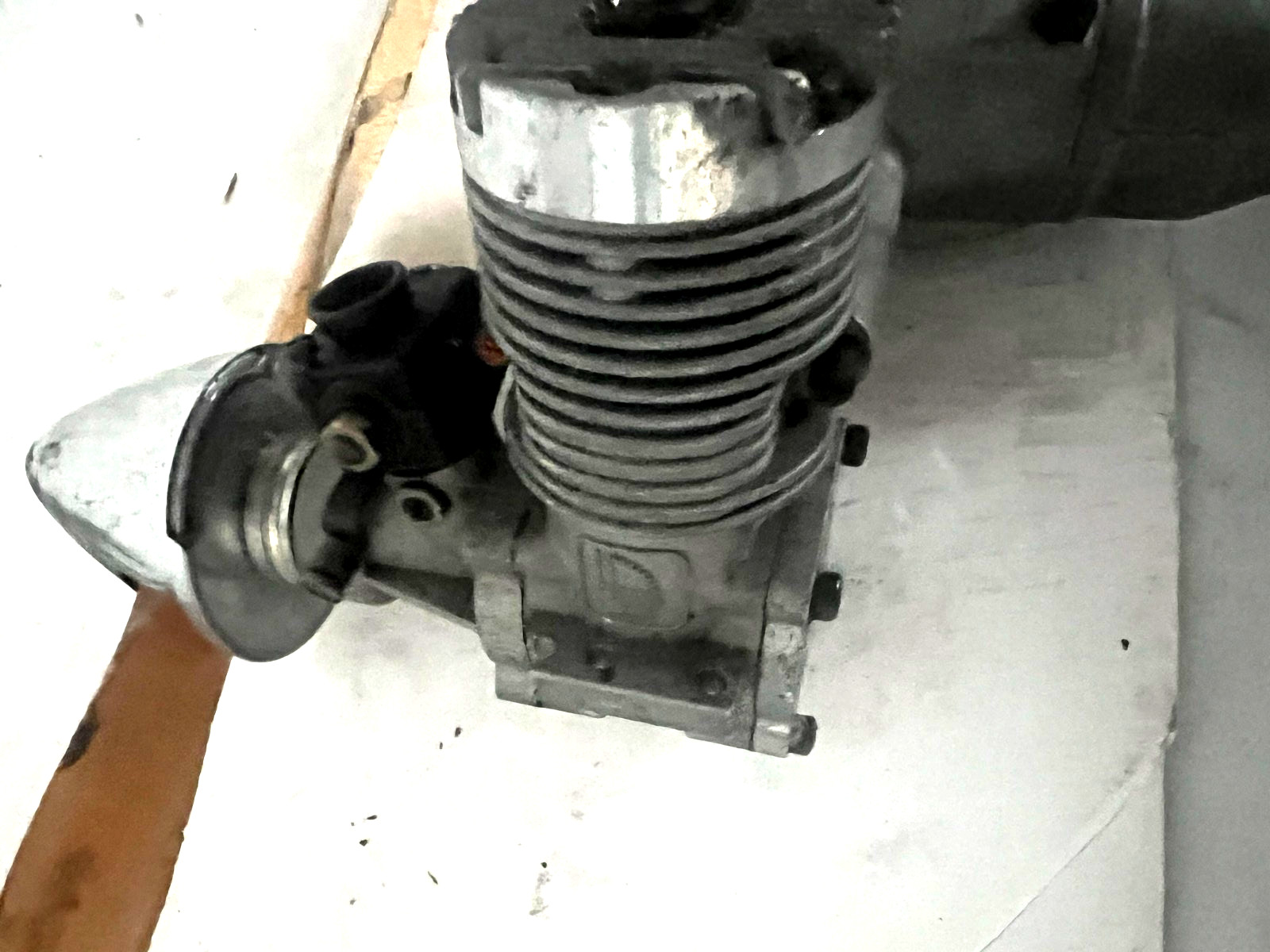 nitro airplane engine with propeller nose have a few scratches