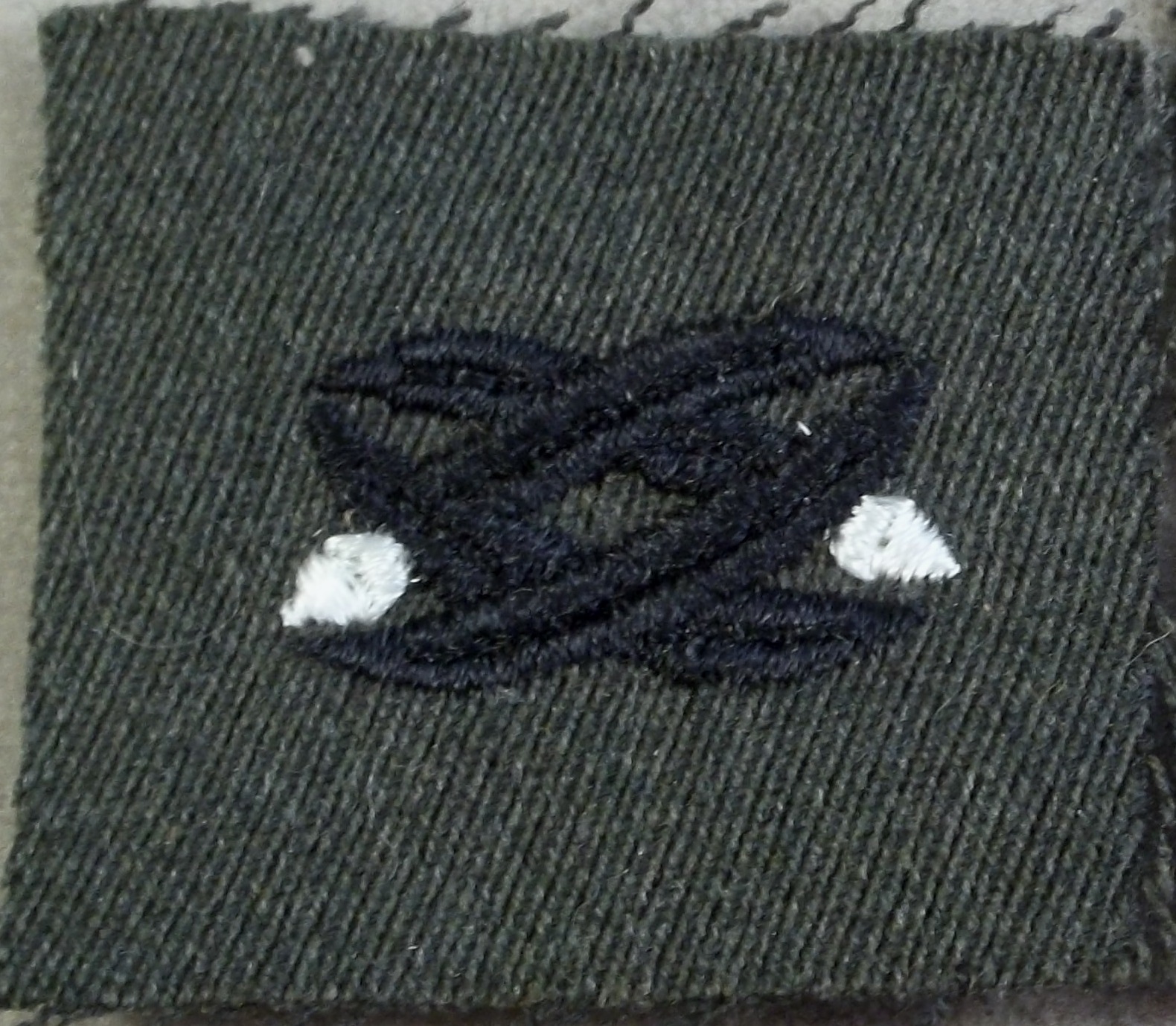 US Navy Civil Engineering Corps Specialty Insignia Pair On Green Gabardine Cloth