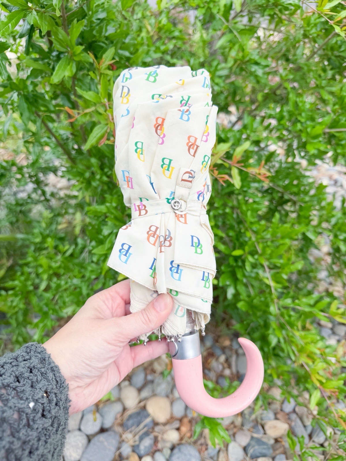 Dooney & Bourke umbrella with a repeating DB logo print Colorful Automatic Open