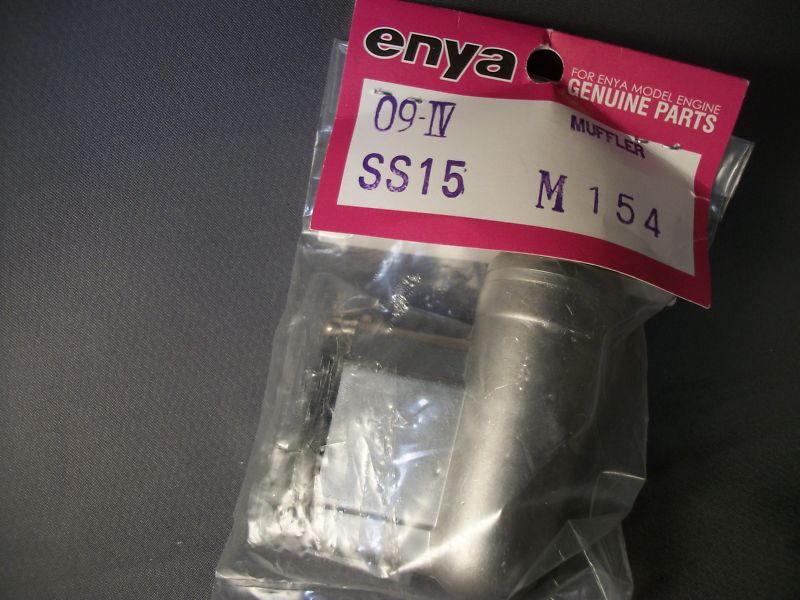 ENYA .09IV 11CX & 15V ,SS.15,15CX & 20S MUFFLER ASSY NIP WITH MUFFLER EARS ONLY