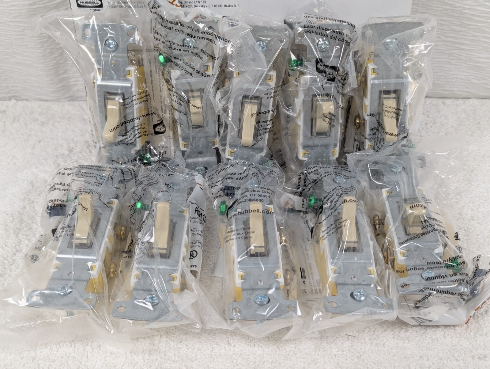 Hubbell RS115ILI Ivory Illuminated Grounded Toggle Switch 15A 120V AC - 10 Pack
