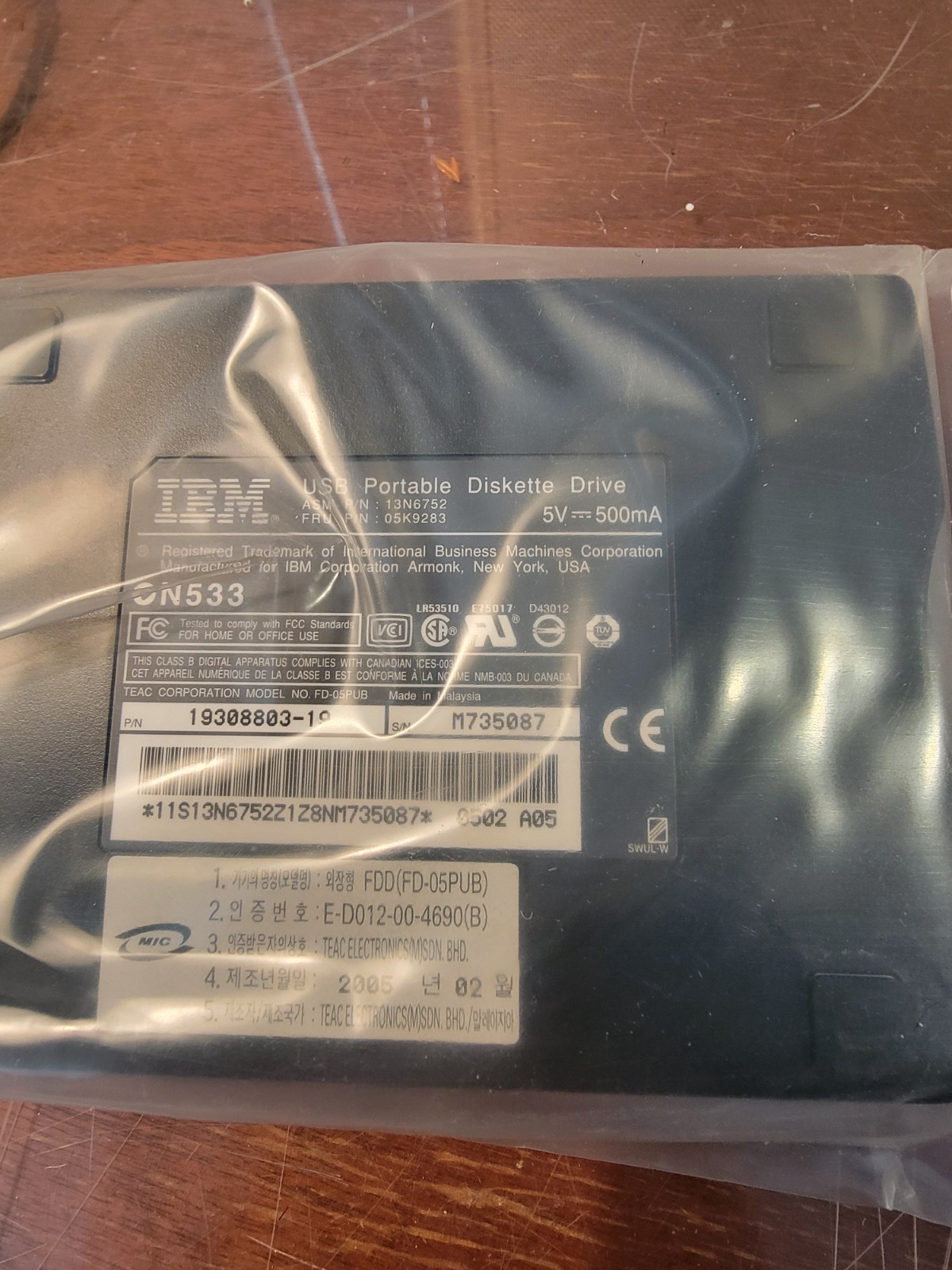 Genuine IBM portable USB 3.5 Floppy drive with case - open box