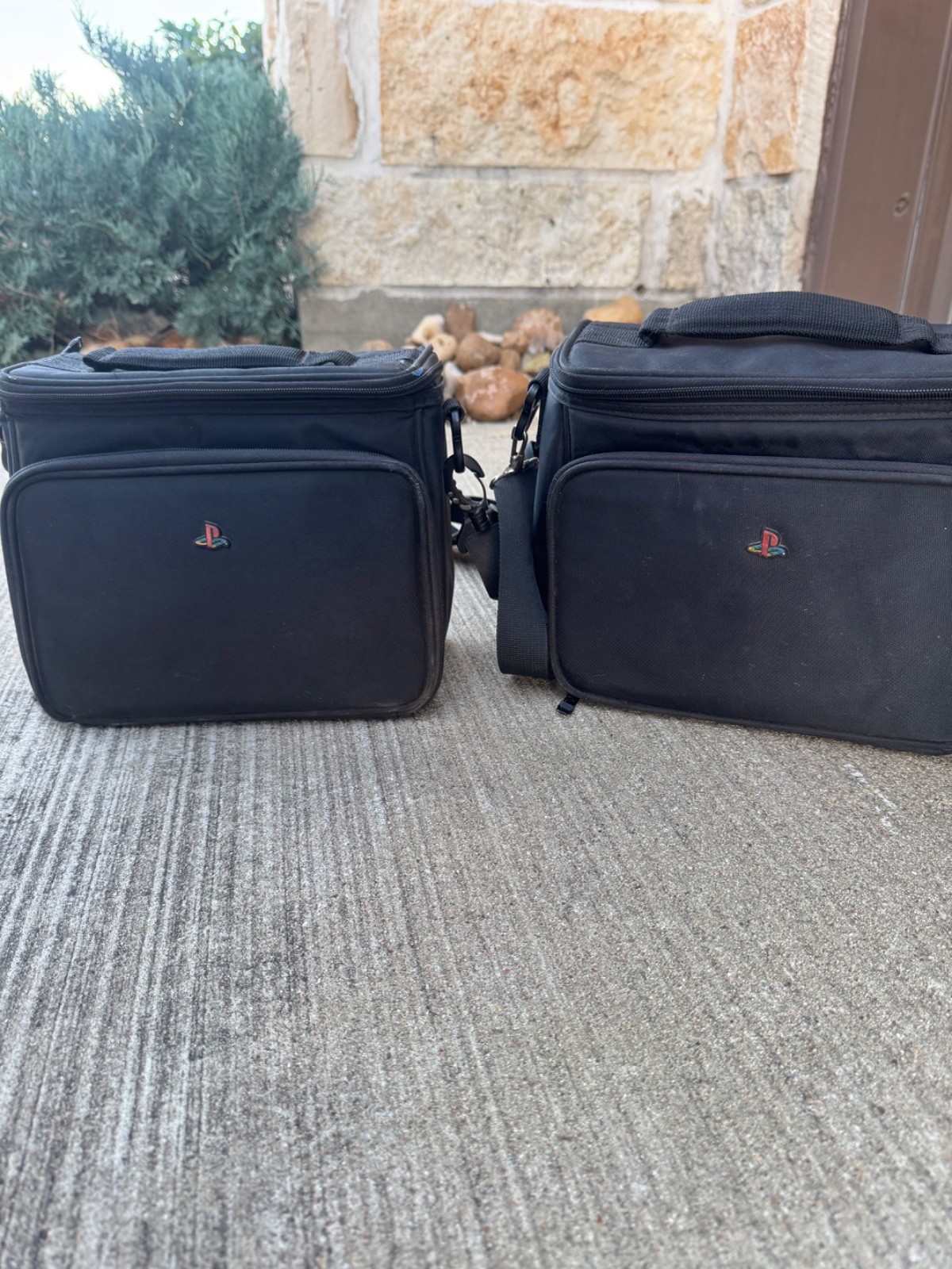 playstation shoulder/carry case Black with the classic red PS logo