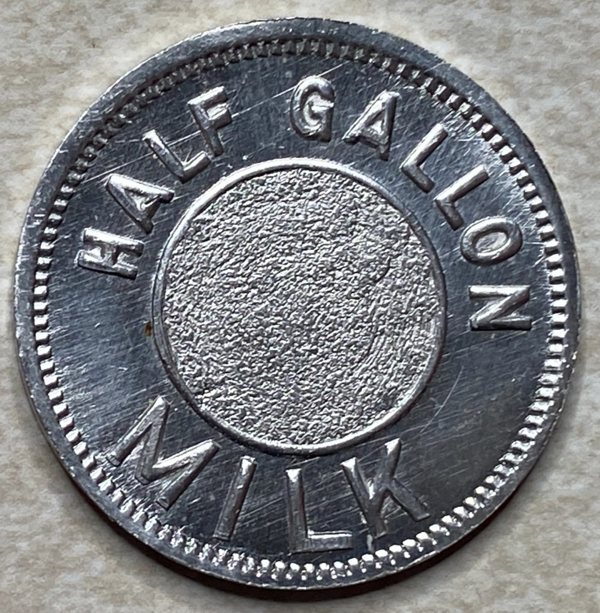 T9173 Half Gallon Milk, Unknown  Anillo Restrike Arcade Token