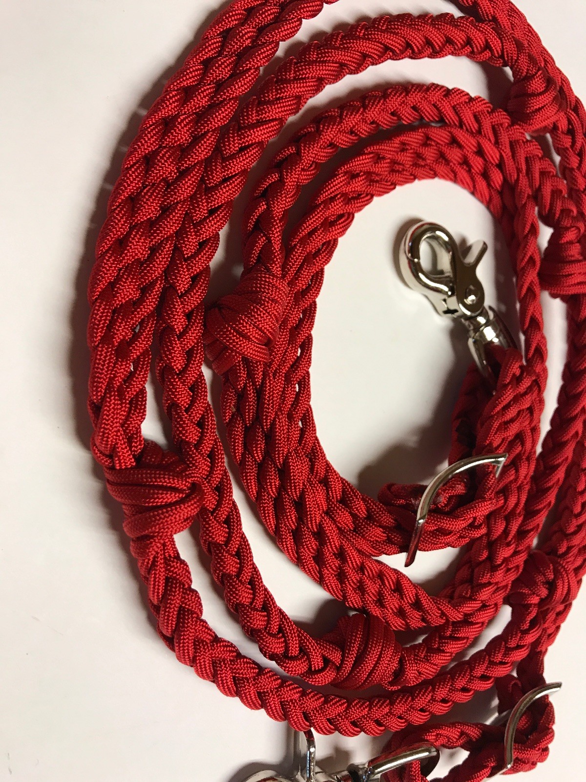 red paracord barrel reins with grip knots