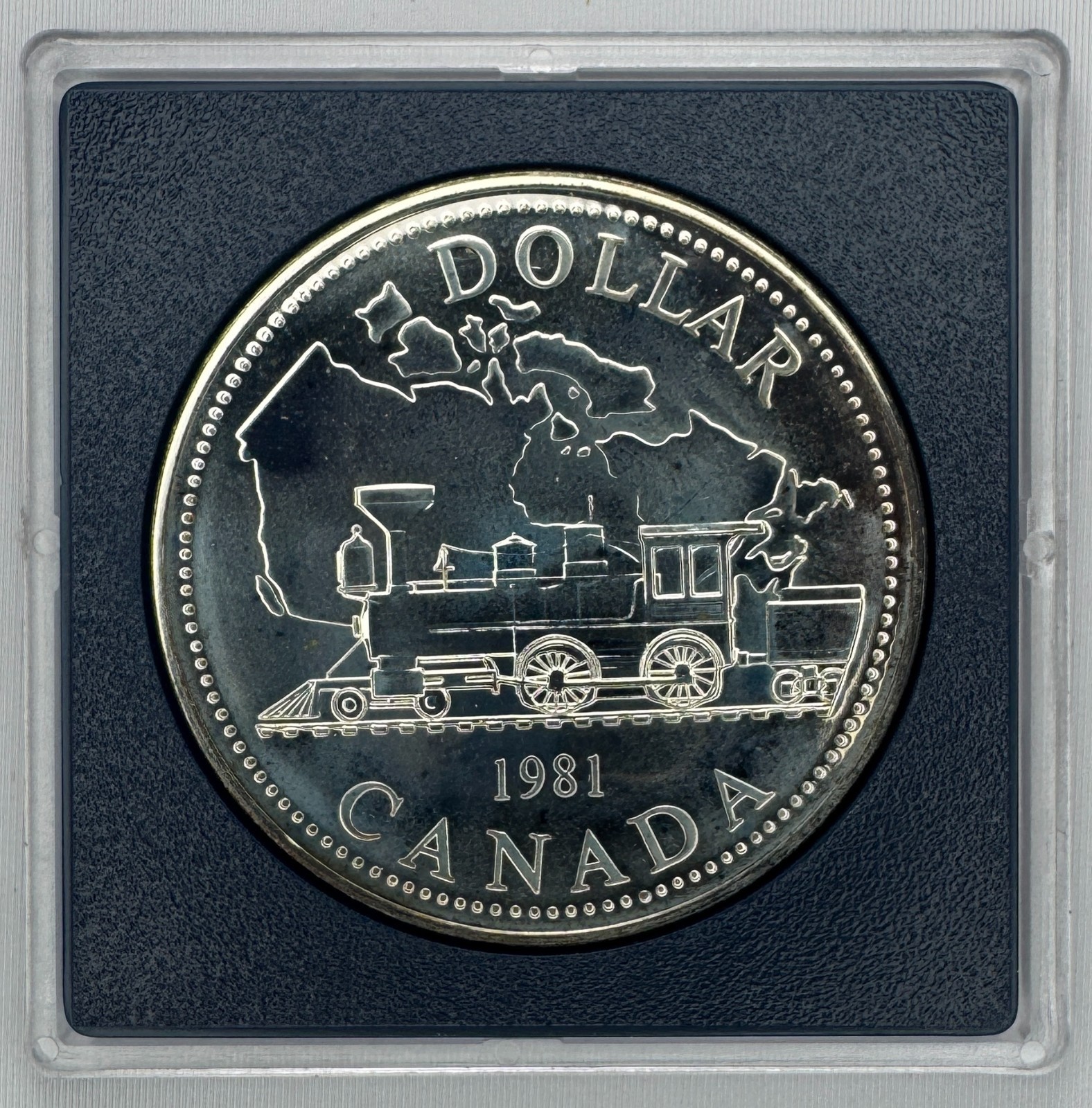 1981 BU Canada Railway Train Engine Silver Dollar RCM Uncirculated Coin Toning
