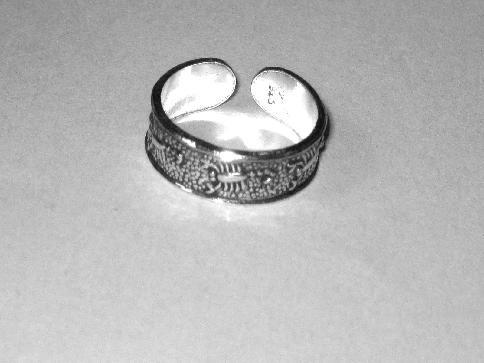 Sterling silver toe ring with  capricorn