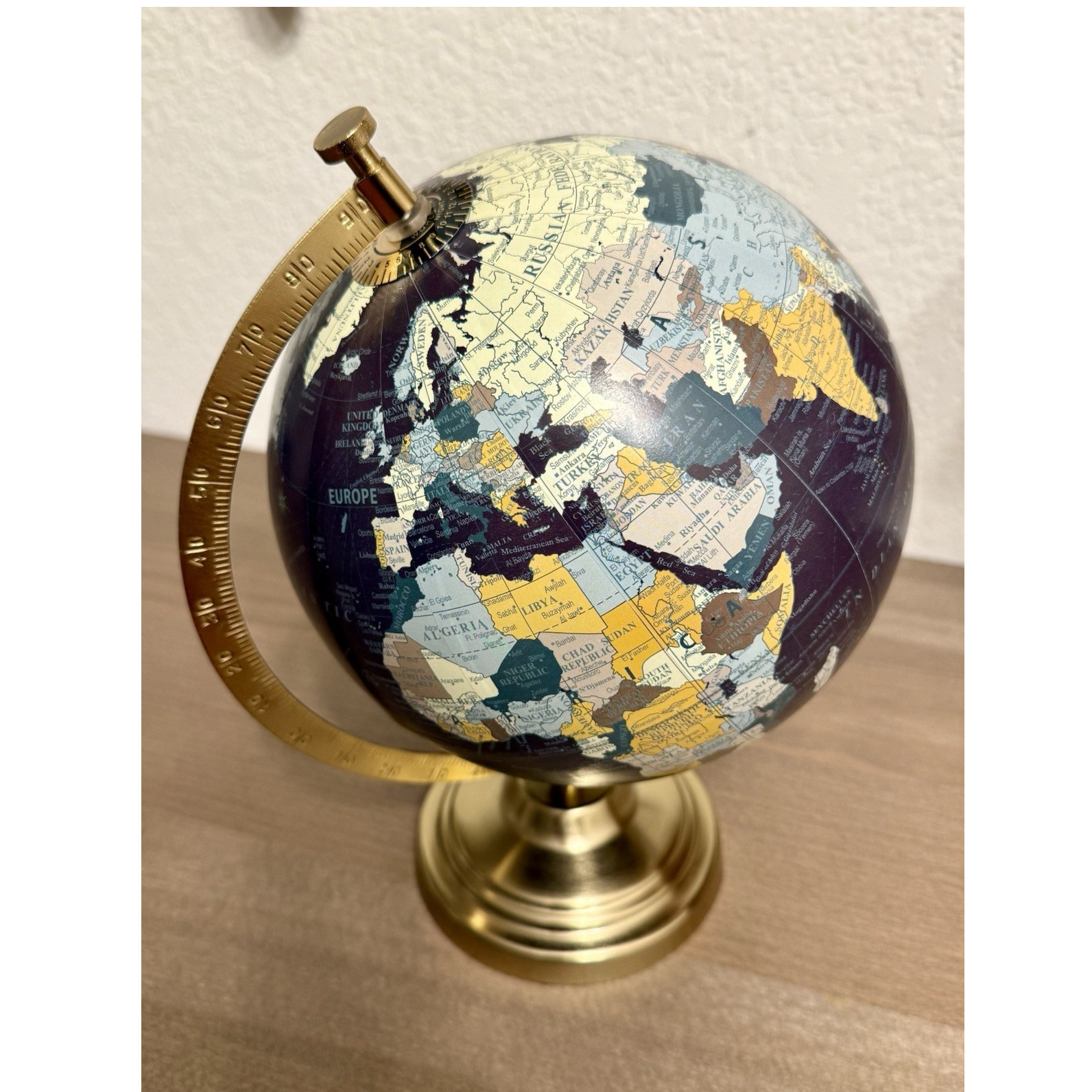 Designco Decorative Tabletop Globe Rotating World Globe Brass Tone Base
