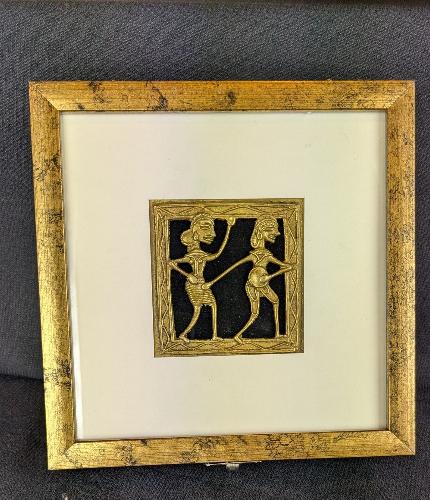 Golden Indian decorative box with tribal decoration