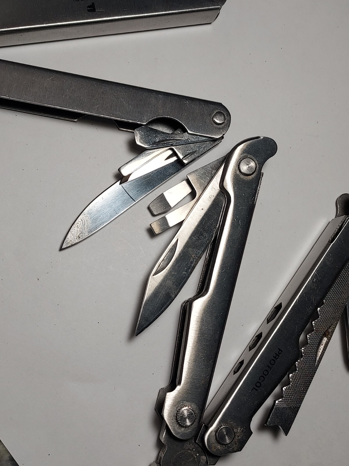 2 Protocol Multi Tools - Pliers, Blade, Screwdrivers