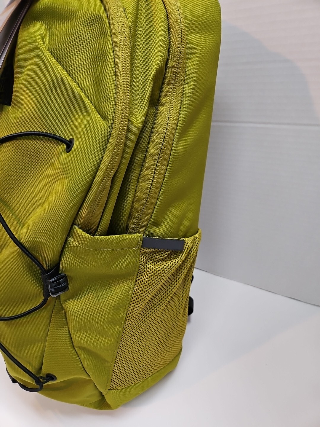 The North Face Jester 28L Backpack. Sulphur Moss.