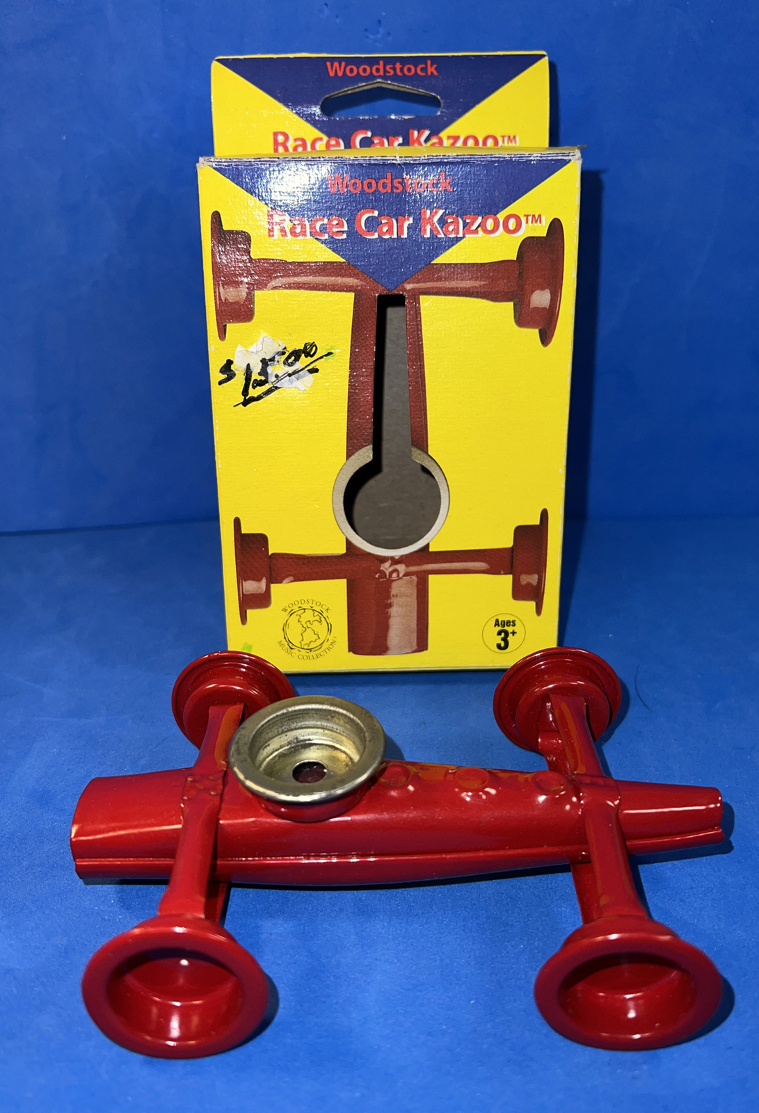 RARE WOODSTOCK ORIGINAL VINTAGE METAL RACE CAR KAZOO NEW IN BOX