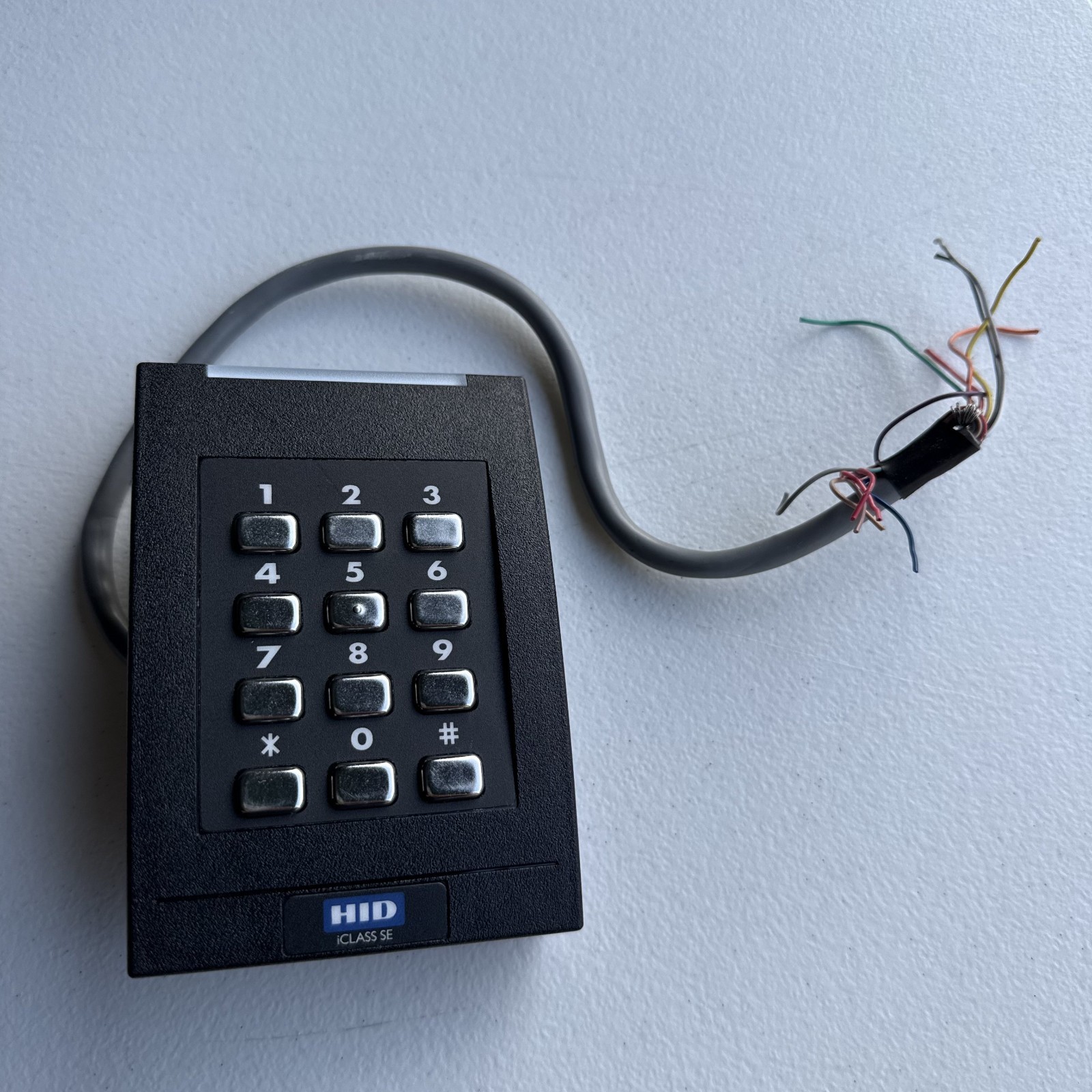 HID 921NTNNEK00000 iCLASS SE RK40 Keypad Wall Switch Reader