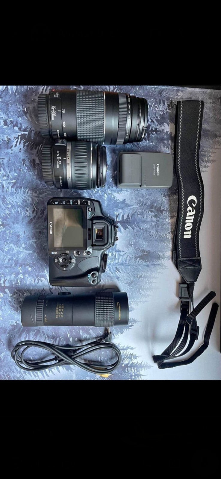 Canon EOS XTI/400D Camera Bundle with EFS 18-55mm, 75-300mm Lenses, Strap, Batt