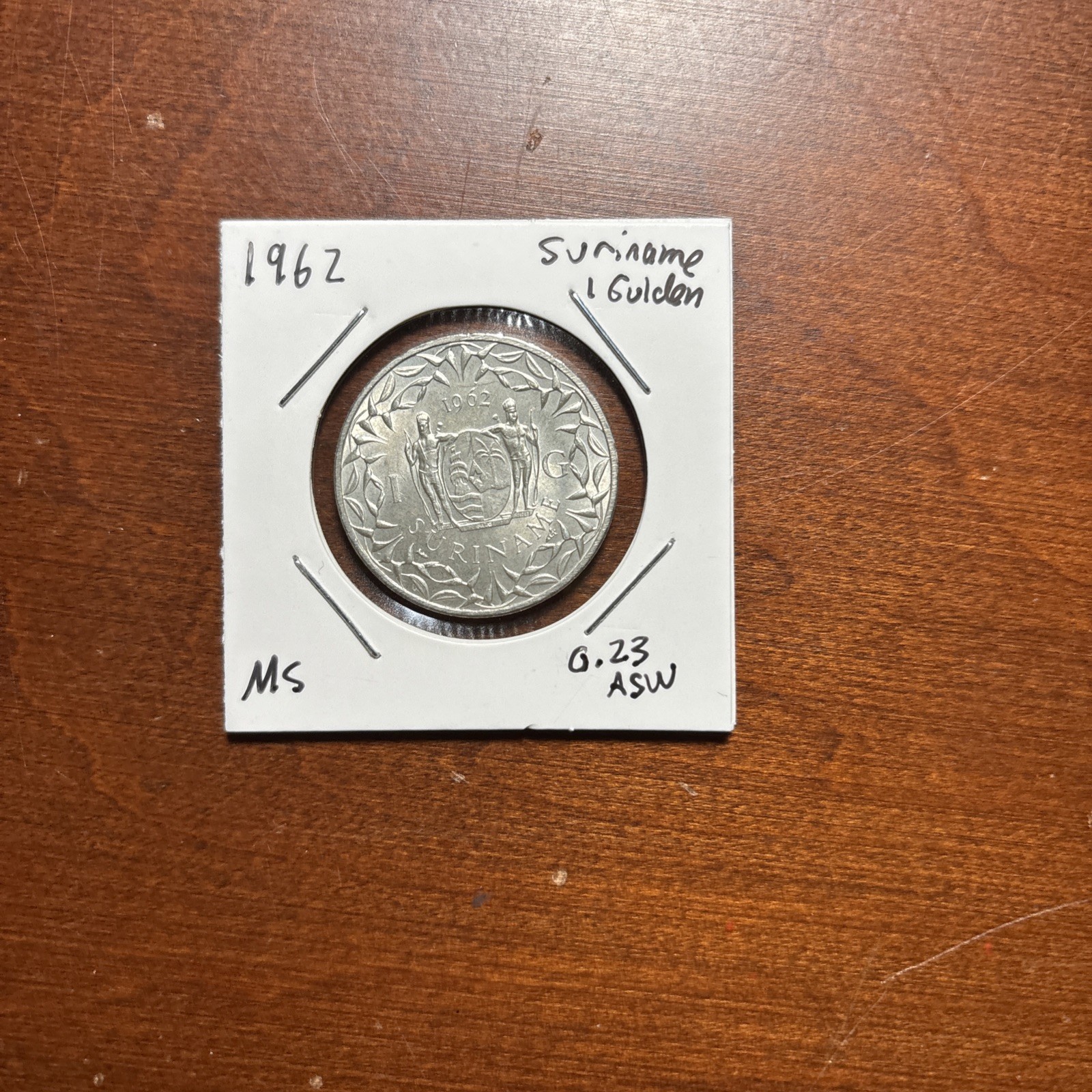 UNDER MELT 1962 Suriname Gulden 0.23 Oz ASW
