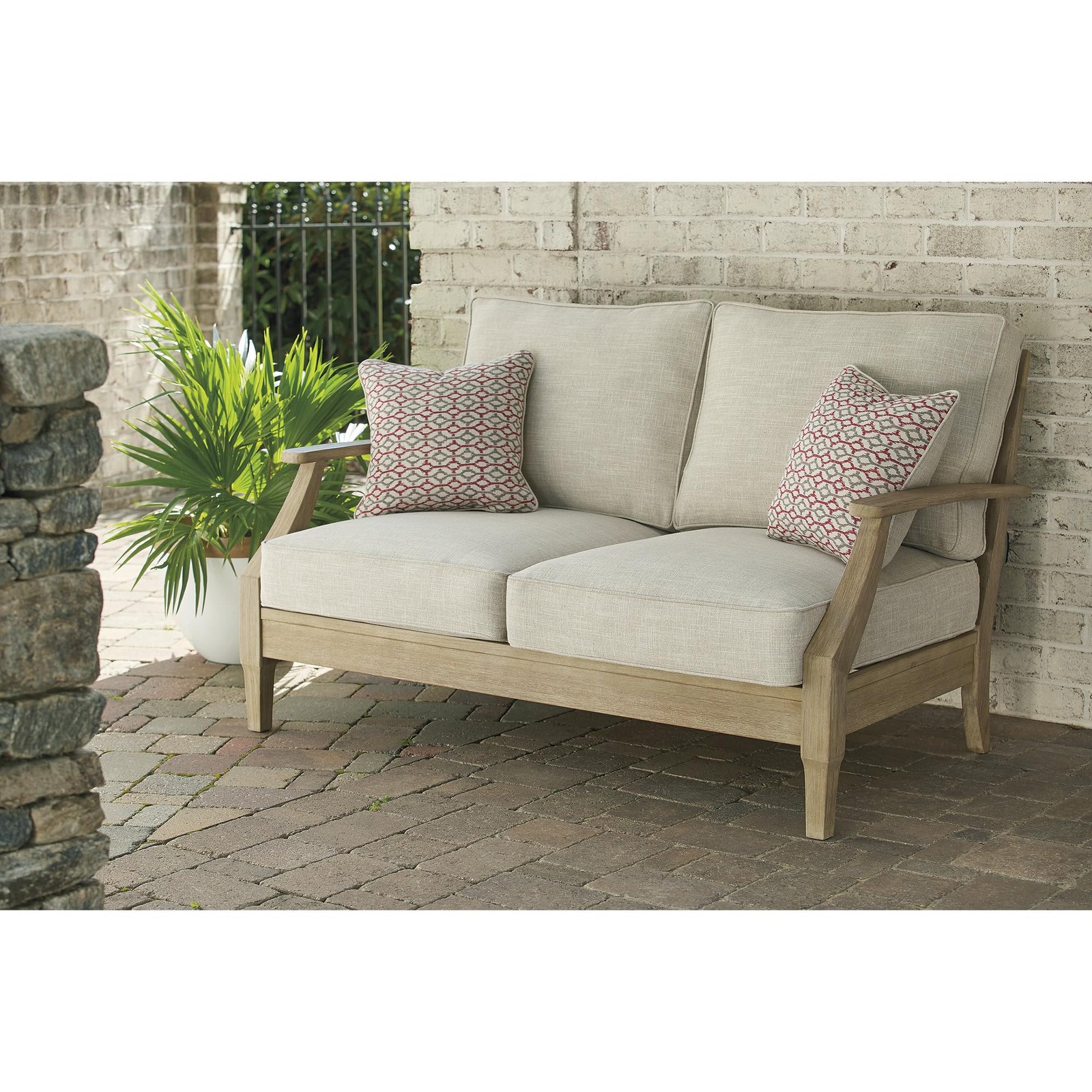 Signature Design by Ashley Clare View Patio Loveseat in Beige