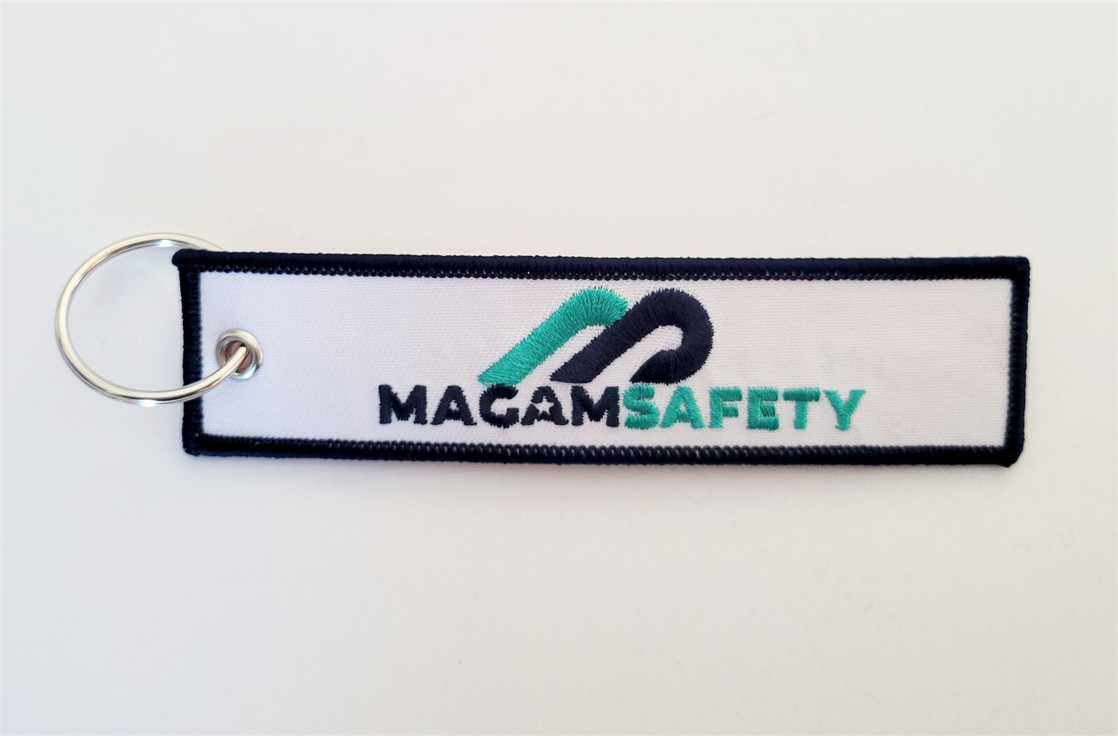 Magam Safety Rescue & Survivability Equipment White Tag Keychain Military