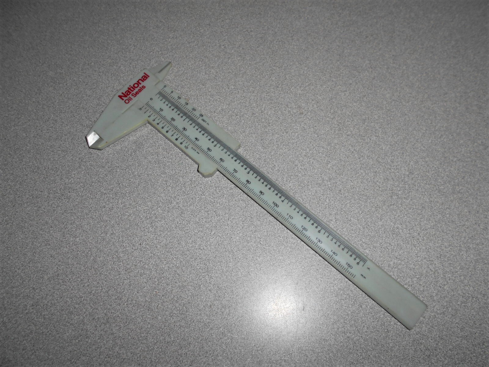 Vintage National Seals measuring caliper plastic inch and metric RARE used