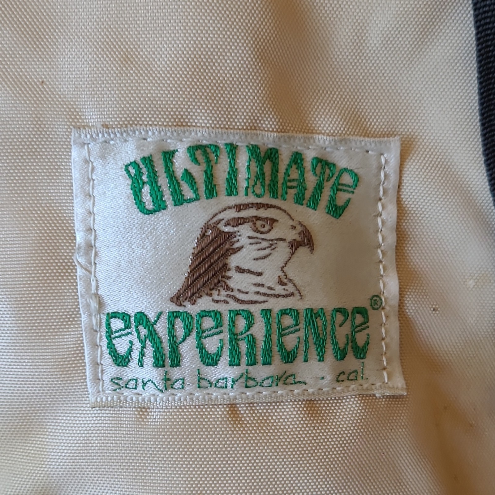 Ultimate Experience Santa Barbara CA Beige Nylon Zip Backpack 5 Pockets Padded