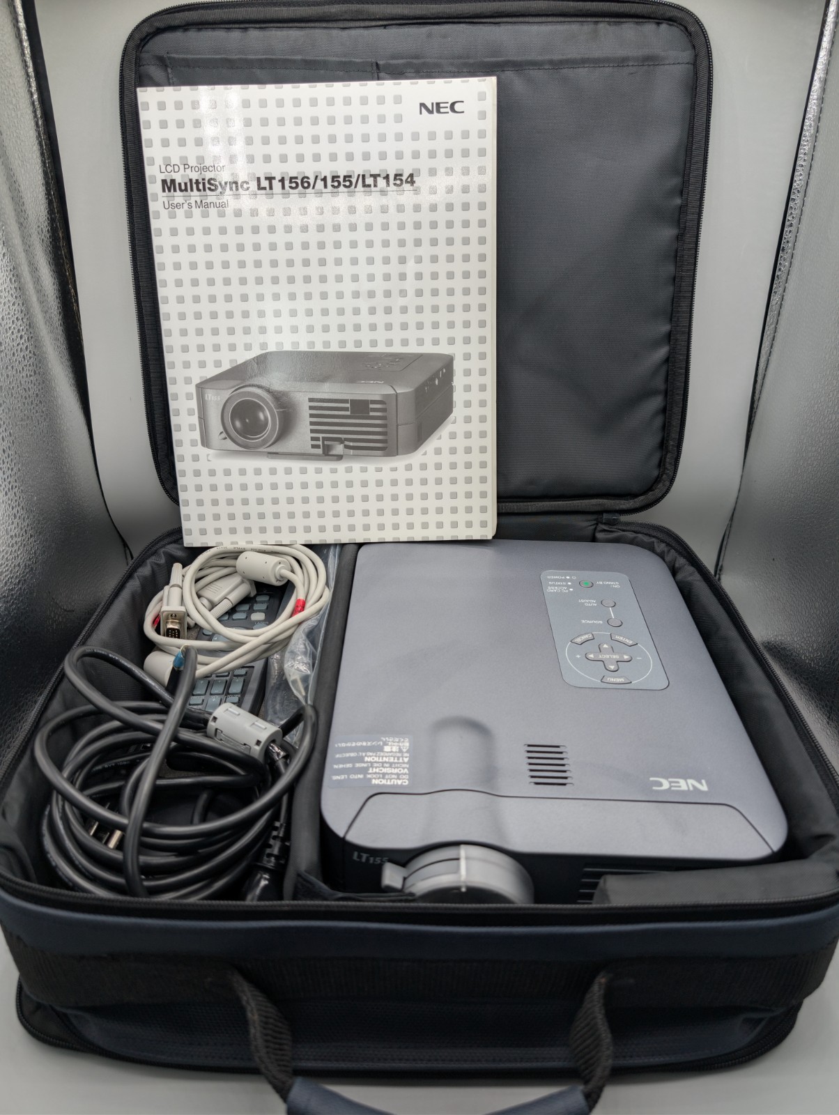 NEC MODEL LT155 MULTI SYNC LCD PROJECTOR W/ CORD USER MANUAL REMOTE CONTROL CASE