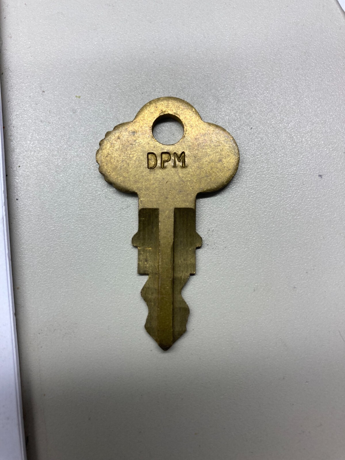Top key for Parking meters with a lock that is stamped DPM