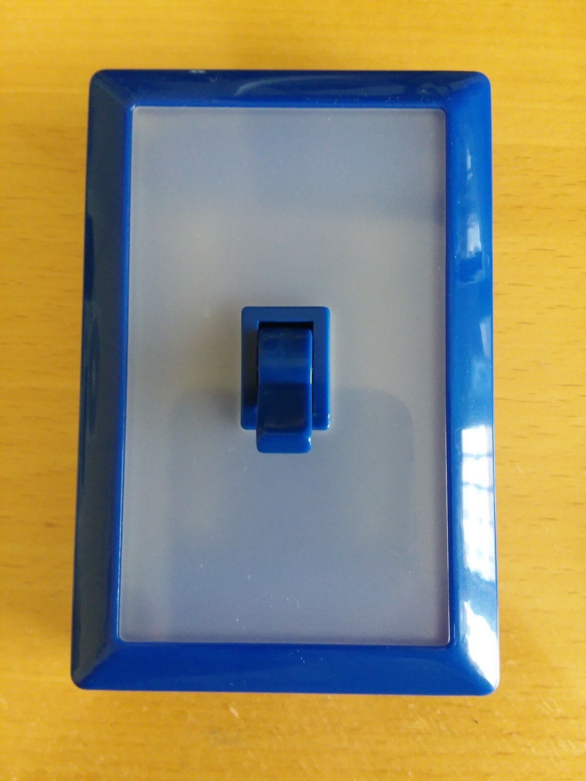 Light Switch Night Light w/Adhesive Back - Light up The Night! In Blue.