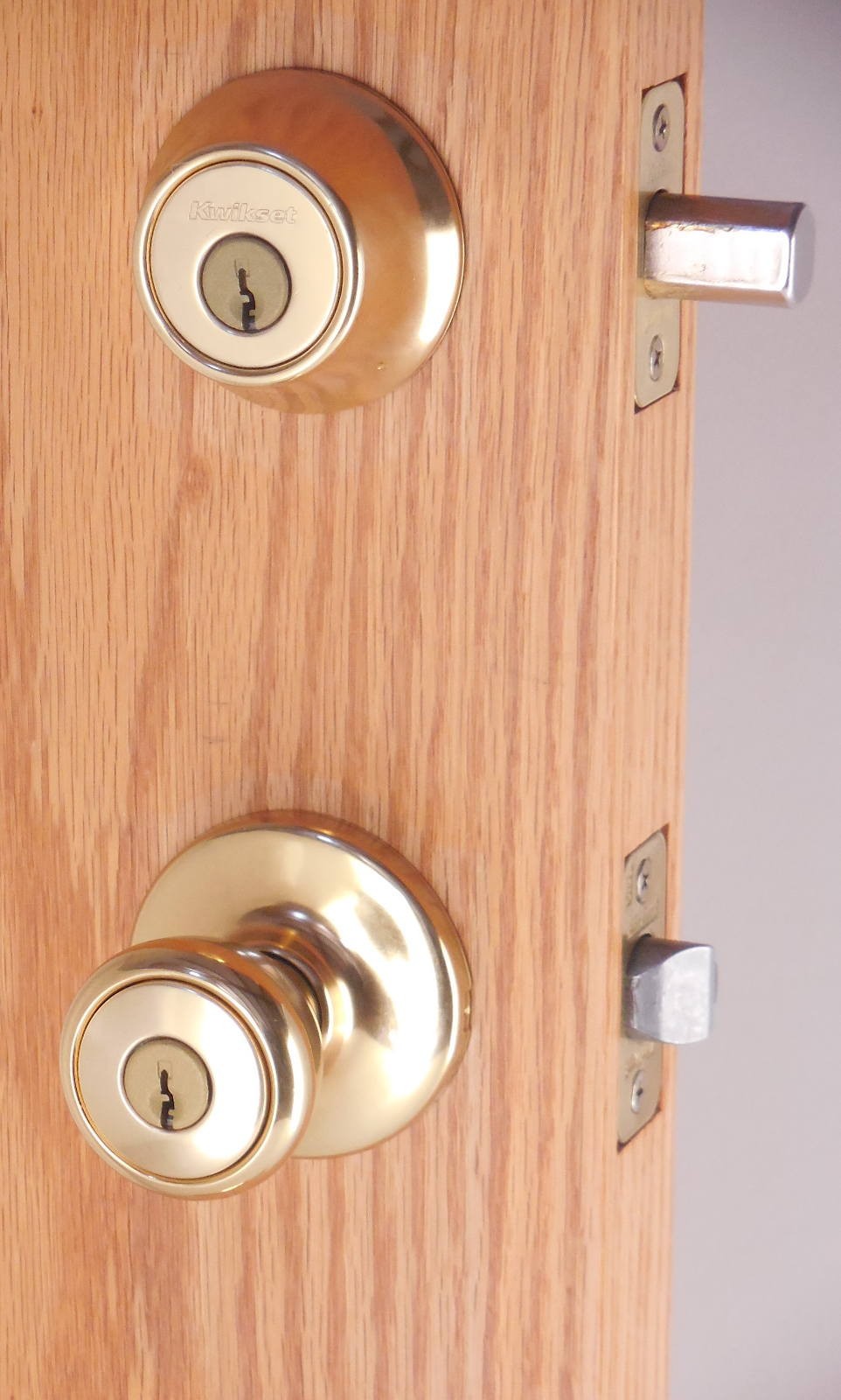 Kwikset Tylo Knob with Double Cylinder Deadbolt Polished Brass 695T3 #96k