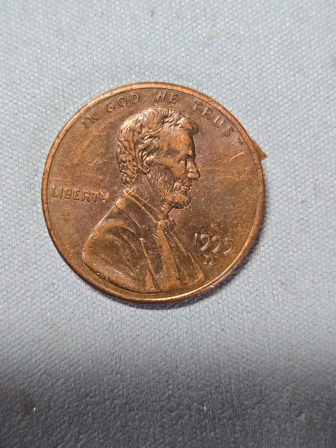 1995 D Lincoln penny with a grease error on the DDR