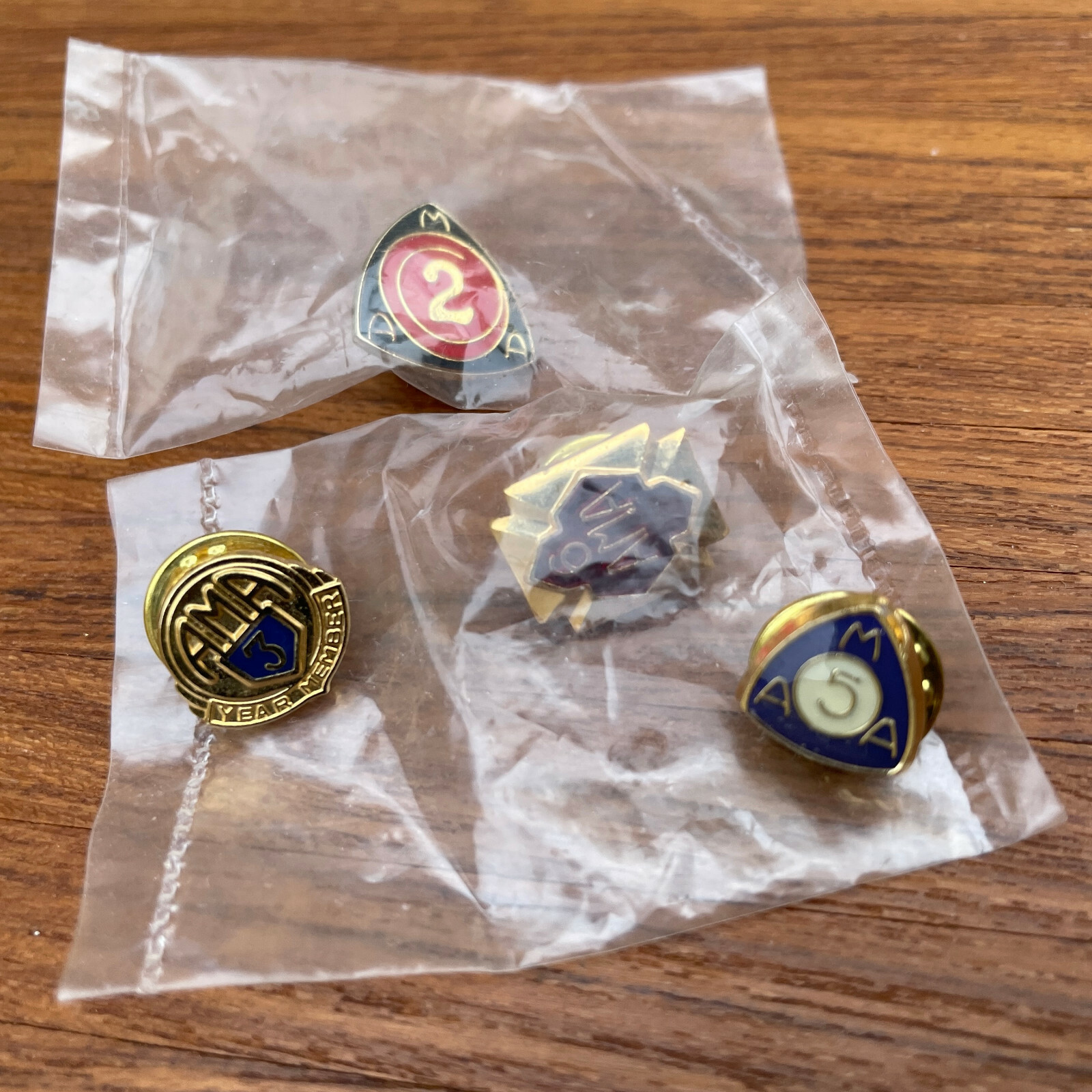 Vintage lot of 4 AMA annual membership pins 2 years 3 years 5 years 6 years