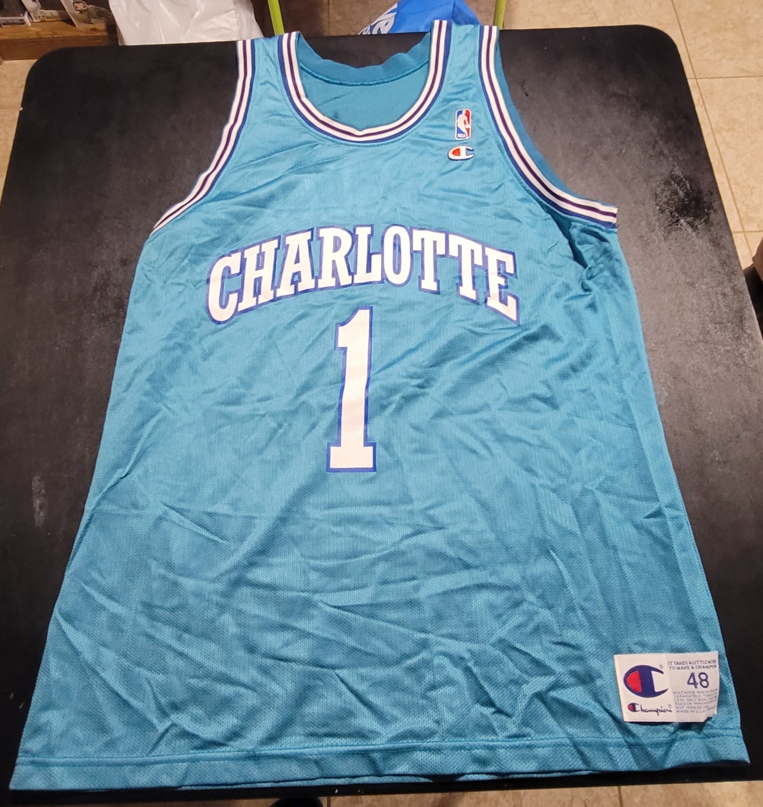 Vintage Mugsy Bouges Charlotte Hornets Basketball Jersey. Size 48