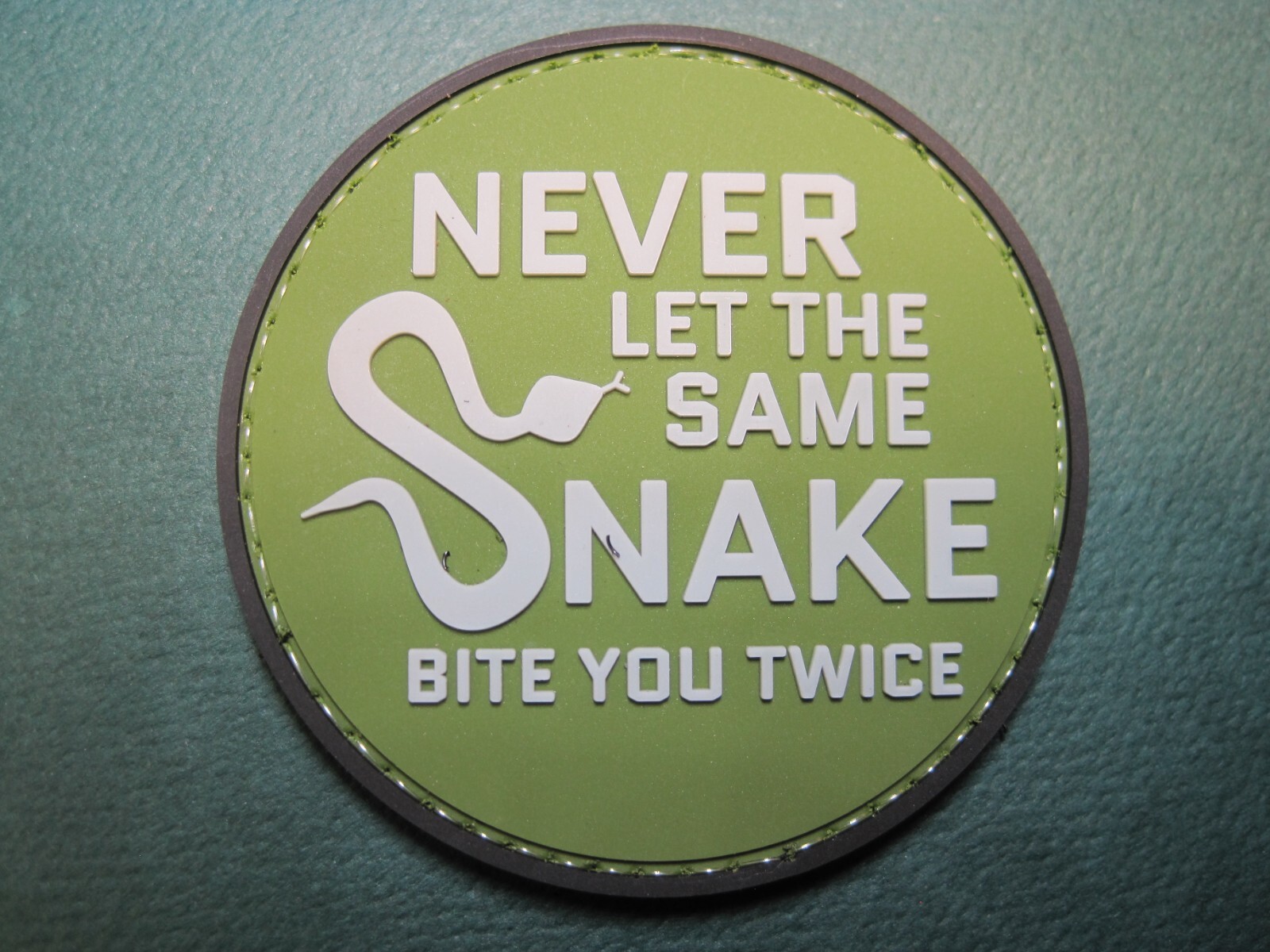 MORALE PATCH "NEVER LET THE SAME SNAKE BITE YOU TWICE" HOOK BACK GREAT DETAIL!