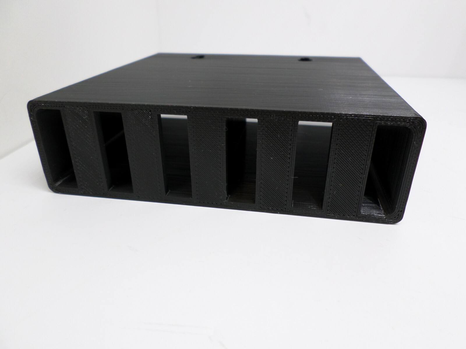 Wall Mount Bracket for 2 remotes.